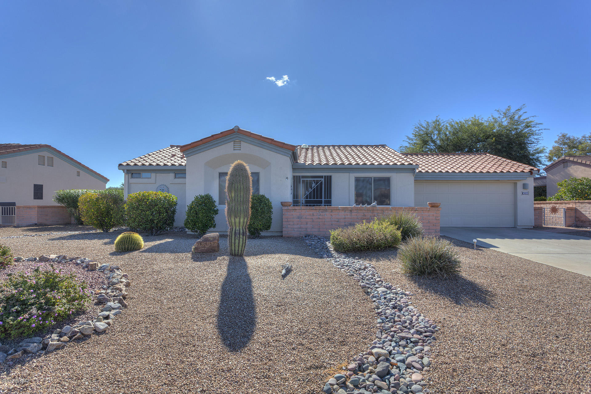 HUGE PRICE REDUCTION! This beautiful home is in Pristine condition with an updated kitchen including Corian Counter Tops, Stainless Steel Appliances and Maple Cabinets. This home is newly painted and is a true showcase with Neutral colors an the walls and quality carpet and ceramic tile. You will fall in love with the over-sized backyard featuring a waterfall, beautiful established landscaping and Fabulous Mountain Views! The extended double garage has extra storage and the cooling/heating unit and hot water heater have been recently replaced. So what could be missing from this home but you? One of the many great features offered in this home is the added flex-room, which opens up endless opportunity of uses from den/office to sewing/hobby room to music room. The extended double garage has an extra storage and cooling/heating unit and hot water heater have been recently replaced. So what could be missing from this home but you?