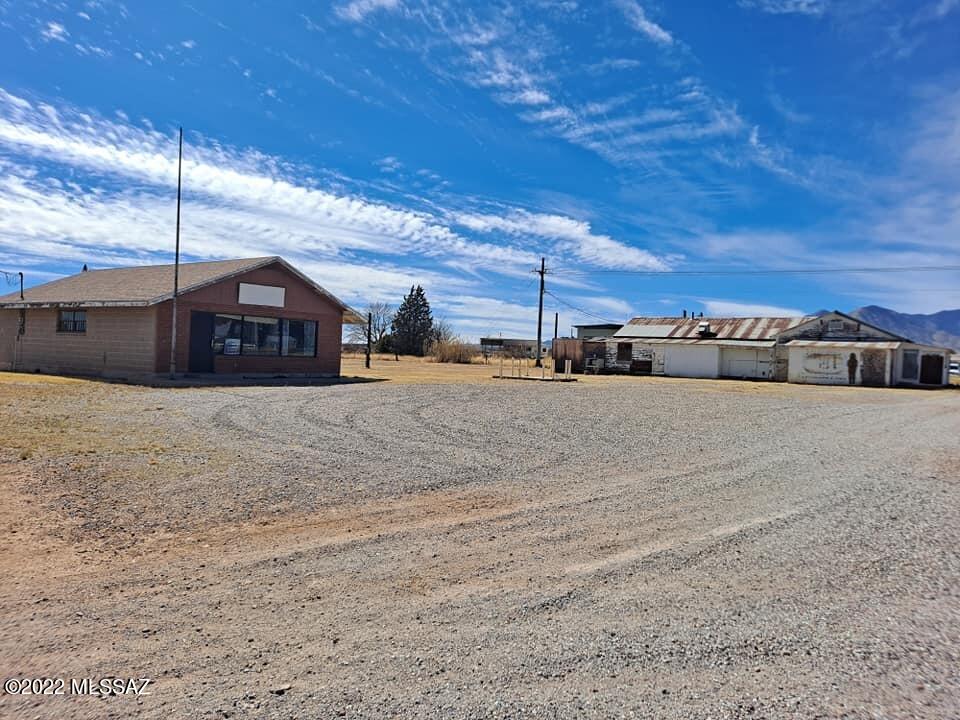 UNLIMITED Possibilities at for this two building property on 2.29 Acres! Previously approved to be a 10+ RV resort and used as a restaurant and trading post. The original Post office building is 1014 Sq. Feet and set up with separate office spaces and fabulous views! The West Building was once the Palominas Trading Post and set up with retail and restaurant space. This building is approximately, 1681 Sq. feet not including extra storage on the outer South side. The property is a 467x214 rectangle, with open space behind the buildings *** waiting for additional buildings or a much-needed RV resort. This Highway Frontage location is a VERY high traffic area between Sierra Vista and Bisbee. Sold AS IS and priced to sell!