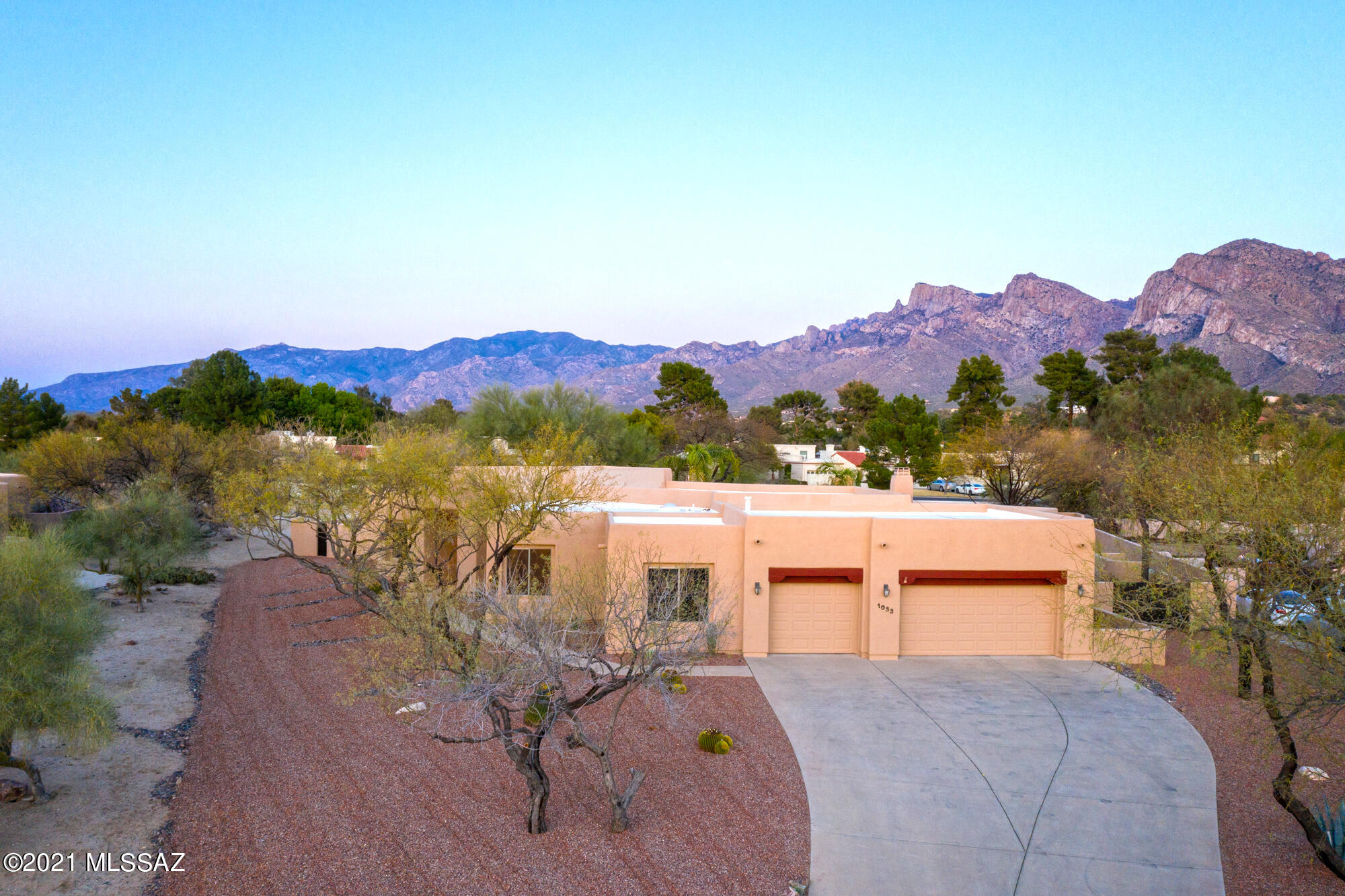 This home is an entertainers dream! Take in the mountain views on the extended covered patio with built in outdoor kitchen and travertine floors. Oasis backyard with sparkling pool & spa. Living and dining room with large picture windows to let in tons of natural light. A chef's kitchen with ample cabinets and a large island. Spacious breakfast nook off the kitchen. The family room is adjacent to the kitchen which is perfect for entertaining.  Both full bathrooms have been totally updated. The spa like master bath has a large walk in closet, dual vanities, & a beautifully tiled walk-in shower. Oversized 3 car garage with storage. Meticulously cared for by original owners. New water softener in 2020, two new HVACs in 2019, brand new pool pump and Pentair gas pool heater. Truly a must see!