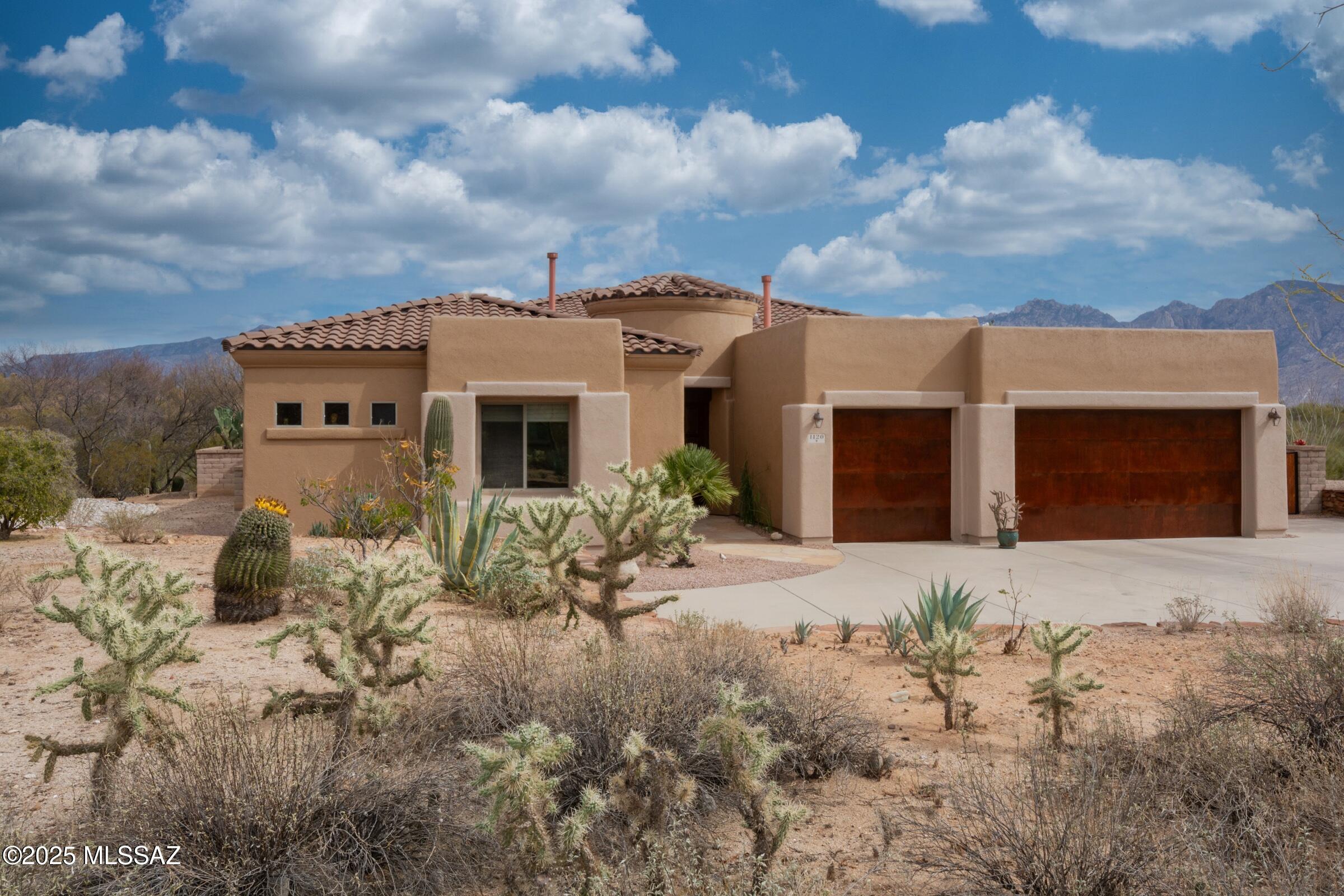 Stunning AF Sterling home on an exceptional ¾ acre lot in Vistoso Highlands.  This 2½ bath home has 3 bedrooms plus a den. The kitchen has granite countertops & a large island perfect for the gourmet chef. The KitchenAid cooktop, oven, microwave & dishwasher have been replaced in 2019.  Outdoor built-in grill has recently been replaced and has never been used. The spaciously covered patio has an outdoor kitchen perfect for entertaining family/friends. The versatile game room can be used as a dining room.  Enjoy the panoramic mountain views as you relax in your heated pool, spa or next to the outdoor Kiva fireplace. The home backs to a wash for added privacy. The doors on the 3-car garage have recently been refinished. Exterior of home has recently been painted.