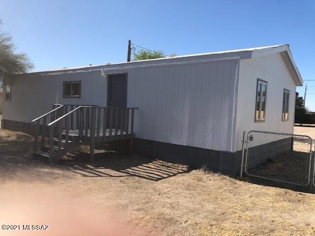 Mountain views of Rillito Mountains. Large backyard area , Newly Painted inside and out. Property is vacant and Owner has made improvements to interior. Quiet neighborhood close and easy access to Interstate . Peaceful Rural Setting.