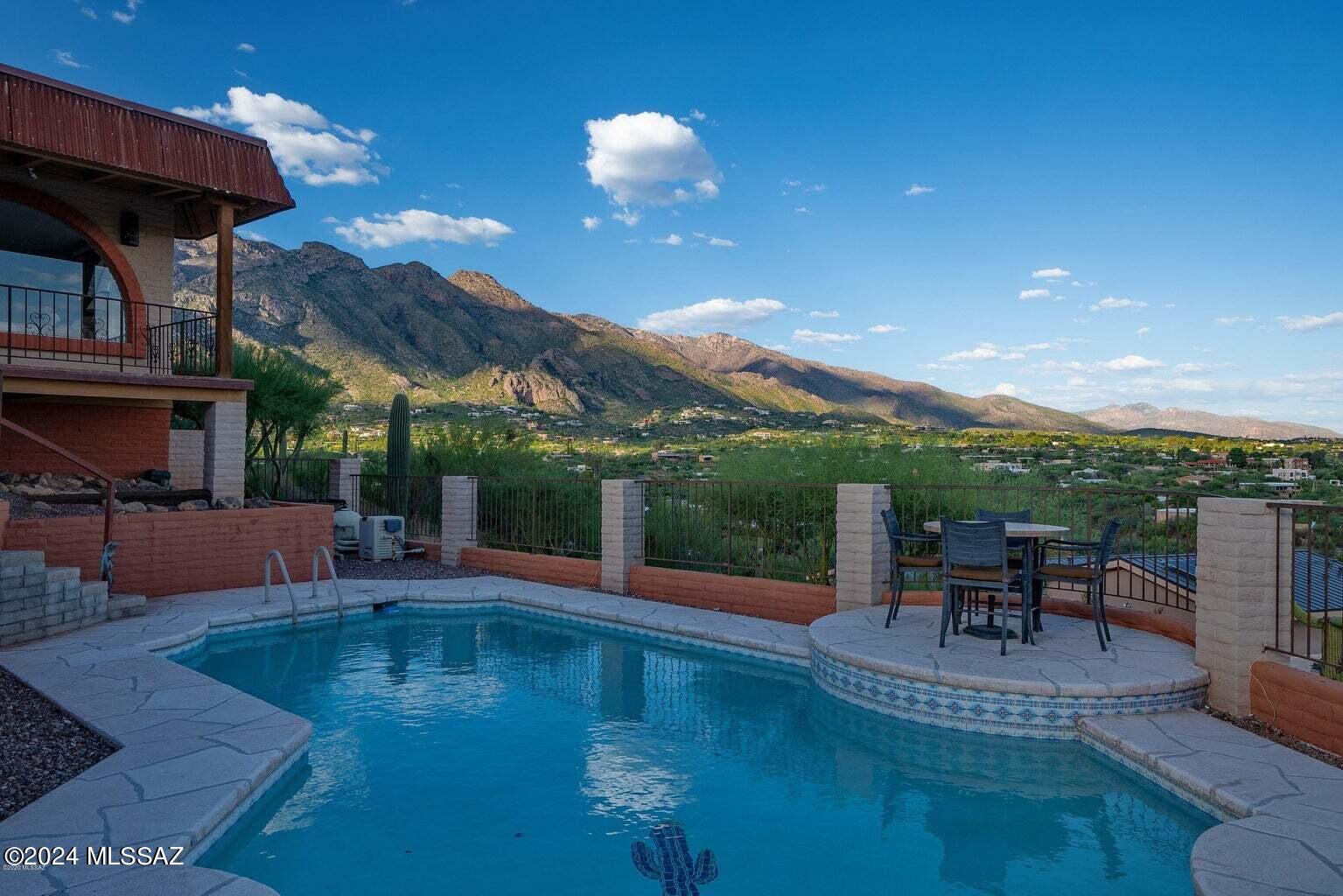 Breathtaking views from this wonderfully updated hillside Foothills ranch. 3 bedroom/ 3 bath with 2 car garage and stunning pool. Open floorplan with views from all windows. Granite counters and Stainless appliances in the spacious kitchen. Private patio to the North. Views to the city and 4 mountain ranges from the porch and pool. Primary suite is situated at the Southeast corner of the home with never ending views from both windows!
Some flooring has been changed from carpet to plank tile after these photos were taken.