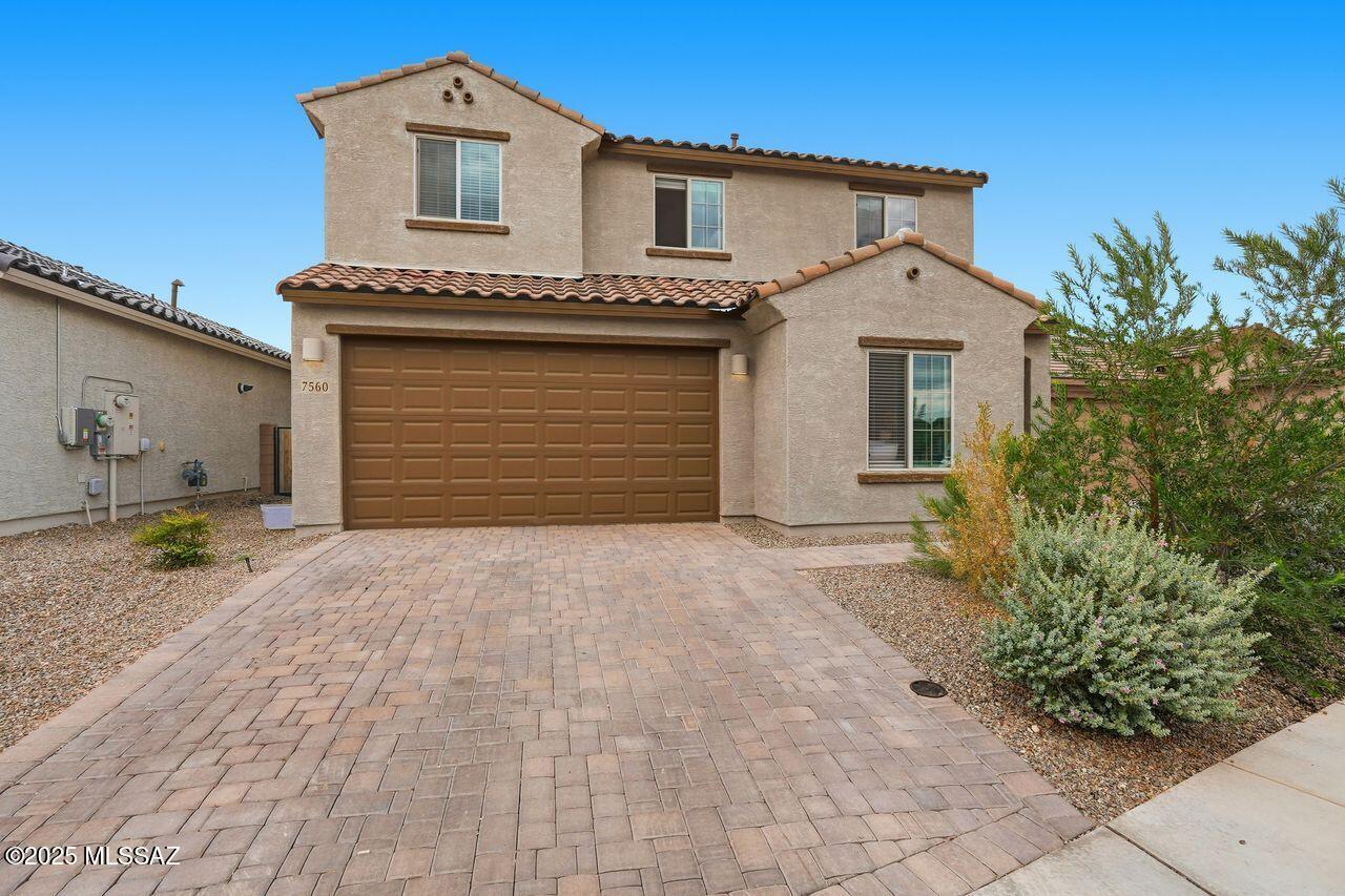 Located on a premium lot in the master planned community of La Estancia. This 4 BD plus loft, 3 BA home has it all and is less than 2 years sold. The kitchen has been upgraded with a gas oven and range, granite countertops and stainless appliances. Enjoy the views of the Catalinas as you sit in your professionally landscaped/finished backyard, complete with turf and pavers. Other features include water softener, epoxy coated 2 car garage, upgraded lighting and ceiling fans and much more. La Estancia has community pools/splash pads, parks, walking paths and the Loop bike path. Close to Raytheon, U of A, downtown and much more. This home has an assumable VA loan at 5.25 % please call to inquire.