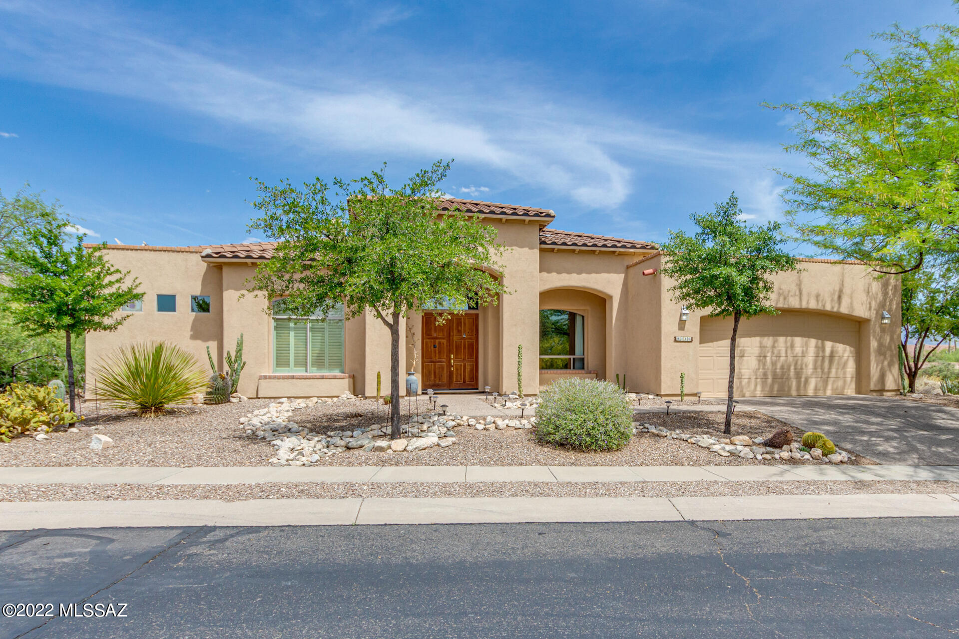 Charming Southwest Contemporary custom built AF Sterling home with stunning MOUNTAIN views!  Located in the master-planned community of Sabino Springs, home of the Arizona Nation Golf Club. This home boasts many upgrades, to include, but not limited to; Cantera wood burning Fireplace in the spacious living room, Gourmet Kitchen complete with Granite Counter Tops, GE profile stainless steel appliances,  an elegant library with built in book shelves and hard wood floor. Spacious owner's en suite with walk in closet, dual vanity sinks, a jetted tub, and separate glass shower.  You'll love the outdoor space with beautiful mountain views, desert vegetation, wildlife, and easy access to hiking and cycling. Very private setting. Sabino Springs Community offers a community pool, spa, and fitness center, nestled among 430 acres of natural desert at the base of the Catalina Foothills in Northeast Tucson. Residents enjoy 24-hour staffing at the community's entrance.
