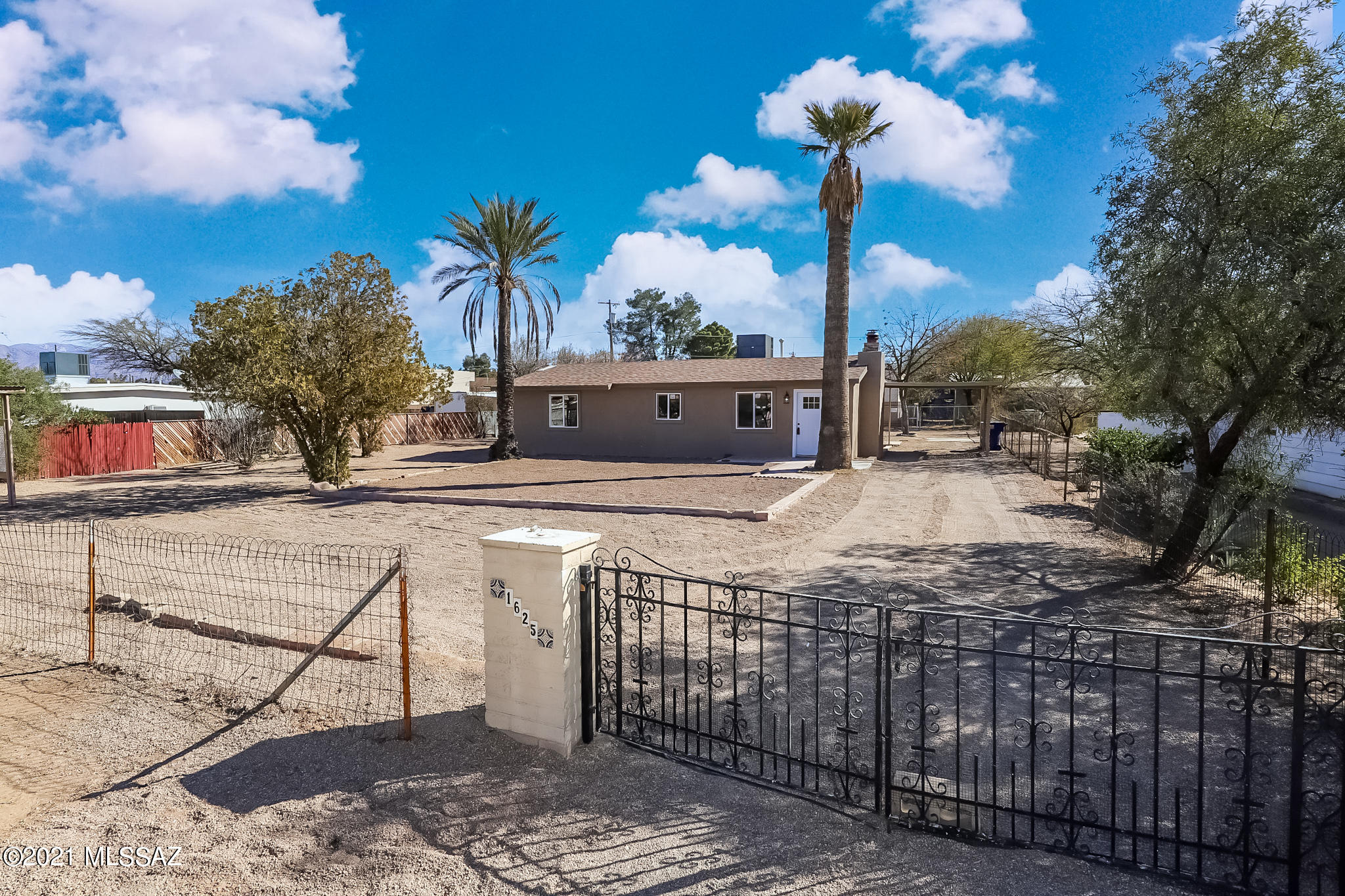 Great opportunity to own a complete remodel in a fantastic central location near Reid Park, University or Arizona, down town, Banner hospital, shopping and much more. This home is a 3 bedroom, 2 bathroom plus an office/den.   The large fenced in .27 acre lot has plenty of room to add on, build a garage or RV parking.   This one is move in ready for new buyers! Owner agent.