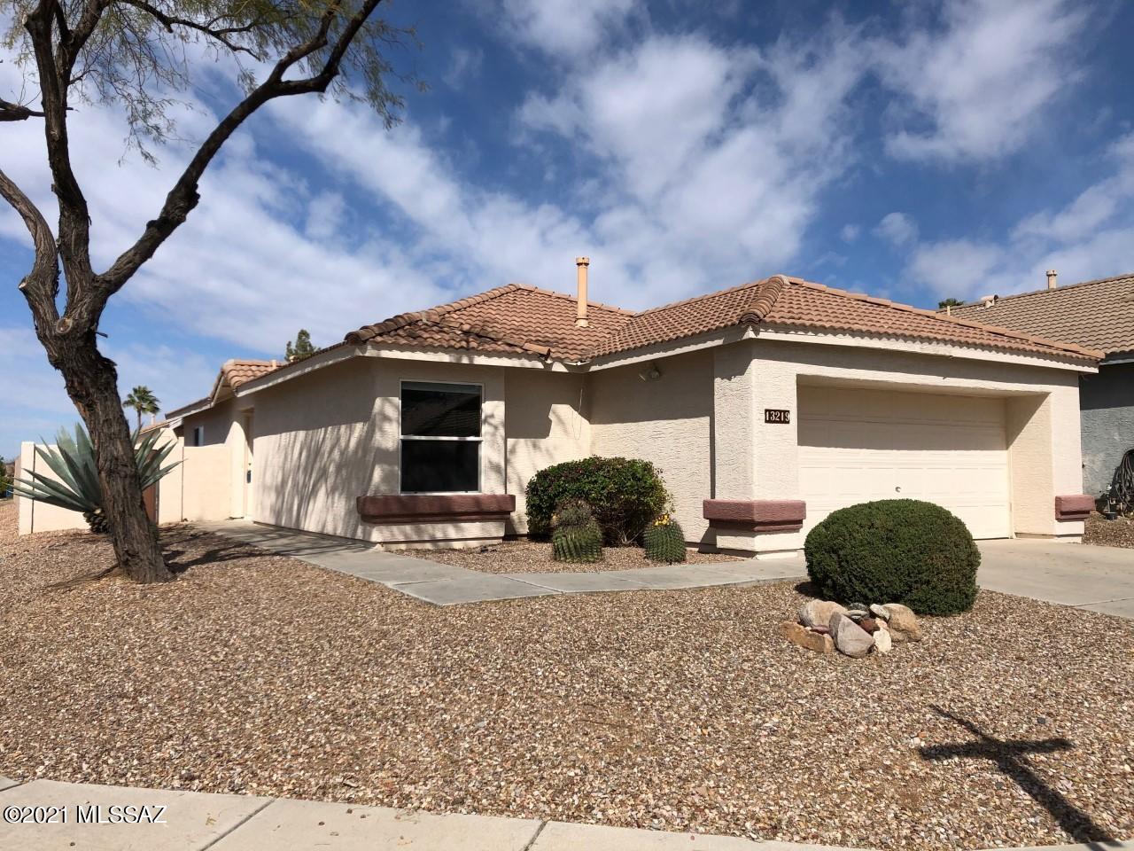 Tucked on one of the largest premium corner lots in the heart of a highly sought after Oro Valley community  w/ mountain views from the front and back yards. 

Enjoy the best of AZ outdoor living located close to walking trails, bike loop & golfing. This home has a spacious great room concept, 2 bedroom, 2 bathrooms, and a den which can be converted to a 3rd bedroom or used as a craft room or office.  Easy care front & rear yards make for a perfect winter or vacation home.  

Covered rear patio and extended brick paver area are perfect  for outdoor entertaining and mountain gazing.  

Why rent when you can own an investment in a booming market.