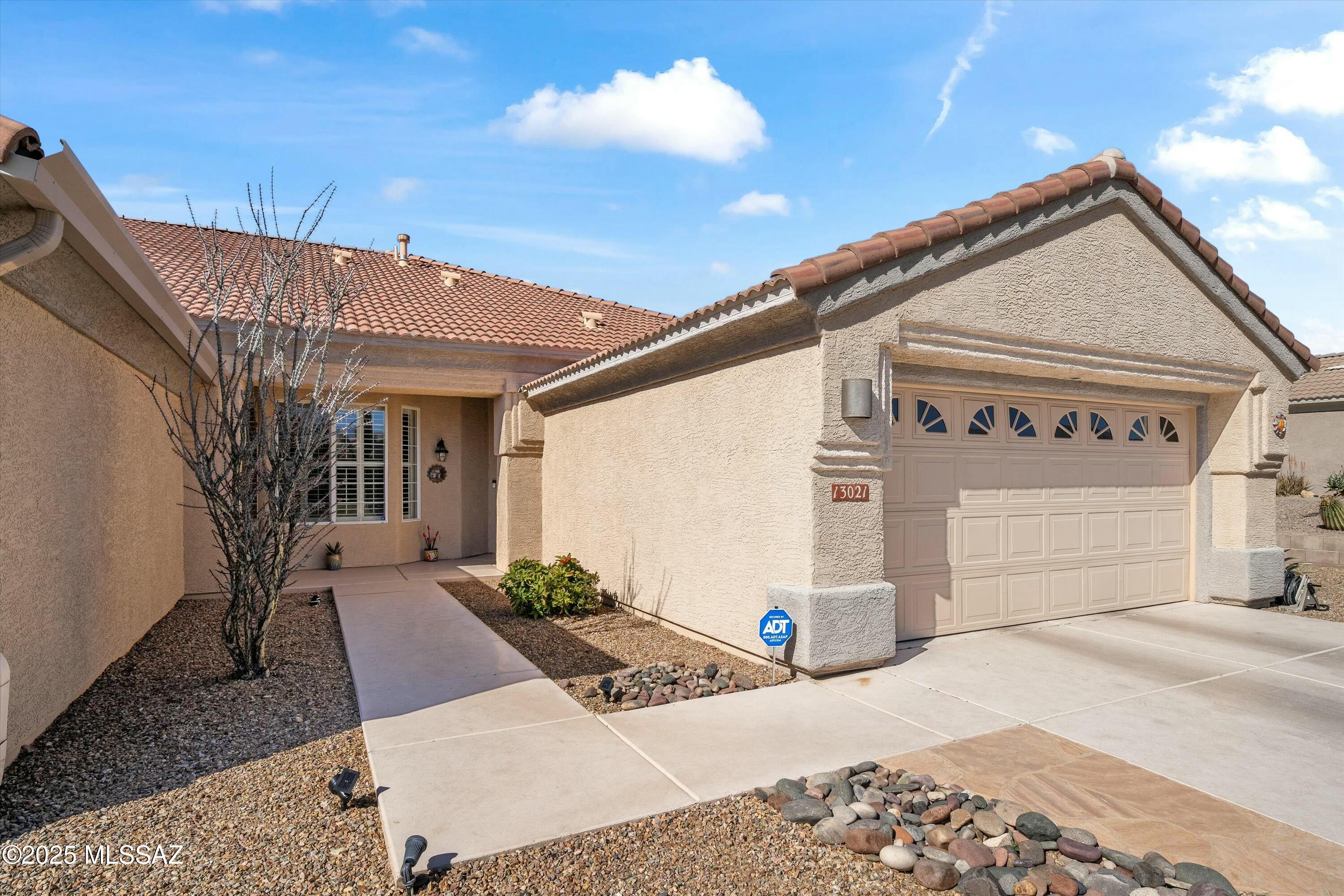 Welcome to this warm and inviting Durango model home with 1,492 square feet of beautifully planned  living space. Thoughtfully designed the home offers 2BR/2BA and is sited on a peaceful cul-de-sac lot. The heart of the home is the kitchen, boasting beautiful granite countertops and SS appliances that create a sleek modern aesthetic. Open concept living and  dining areas, enveloped by plantation shutters, creates an ideal space for both entertaining and everyday comfort. A primary bedroom is tucked away in the rear of the home featuring an ensuite , walk-in closet and step in shower. A guest bedroom , complete with additional storage is conveniently located near the guest bath. A screened in patio provides a perfect spot to relax and enjoy the outdoors. Numerous upgrades throughout .