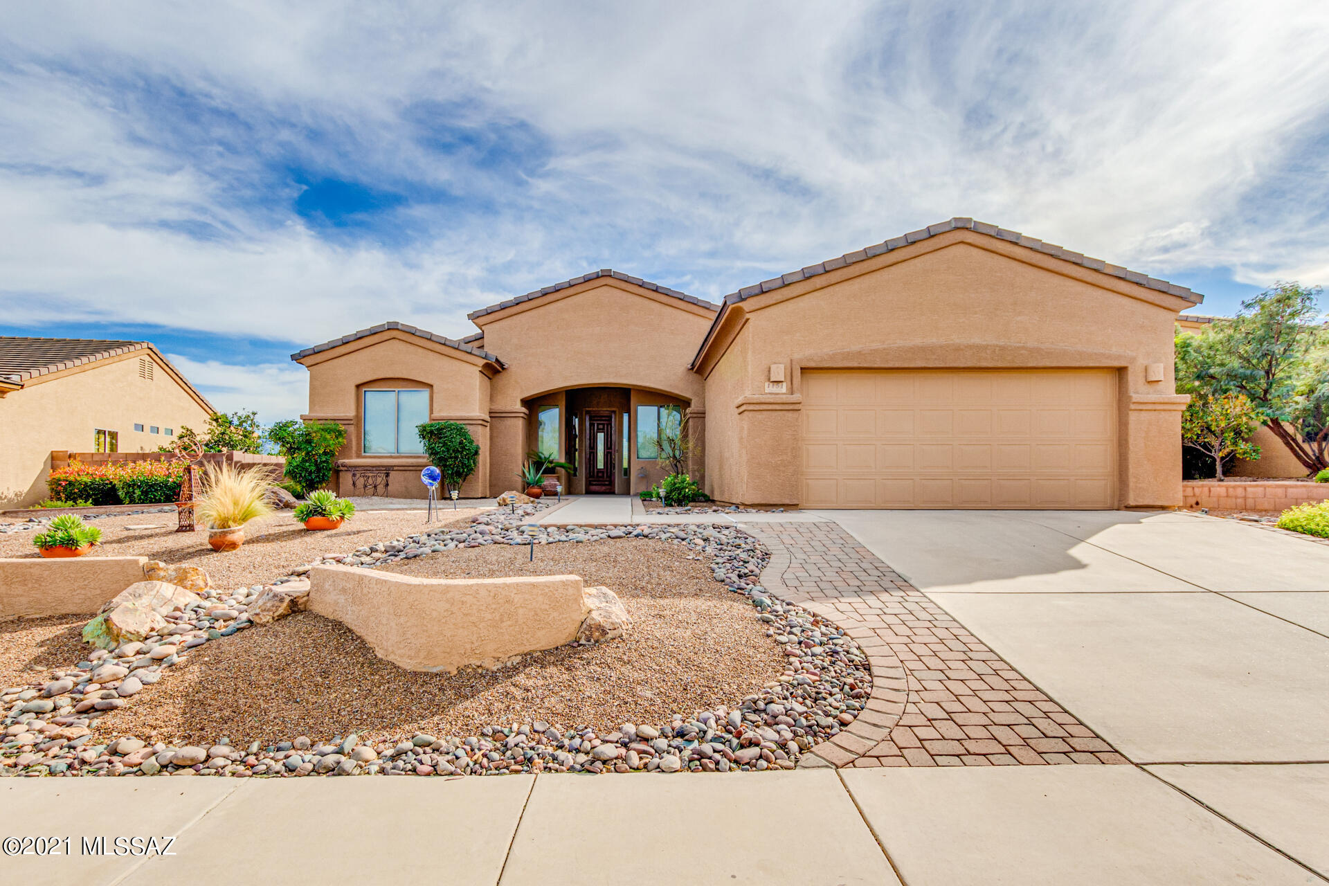 Amazing views and fabulous location. You found the home you have been waiting for. It has everything you could ask for and more. This well maintained home features, fresh paint, newer roof with warranty and a water softener. The kitchen is perfect for entertaining and the breakfast bar is an added bonus. The office/flex room gives you plenty of space. When you walk outside to the private backyard,  you are greeted by a beautiful waterfall and stunning views of the mountains.