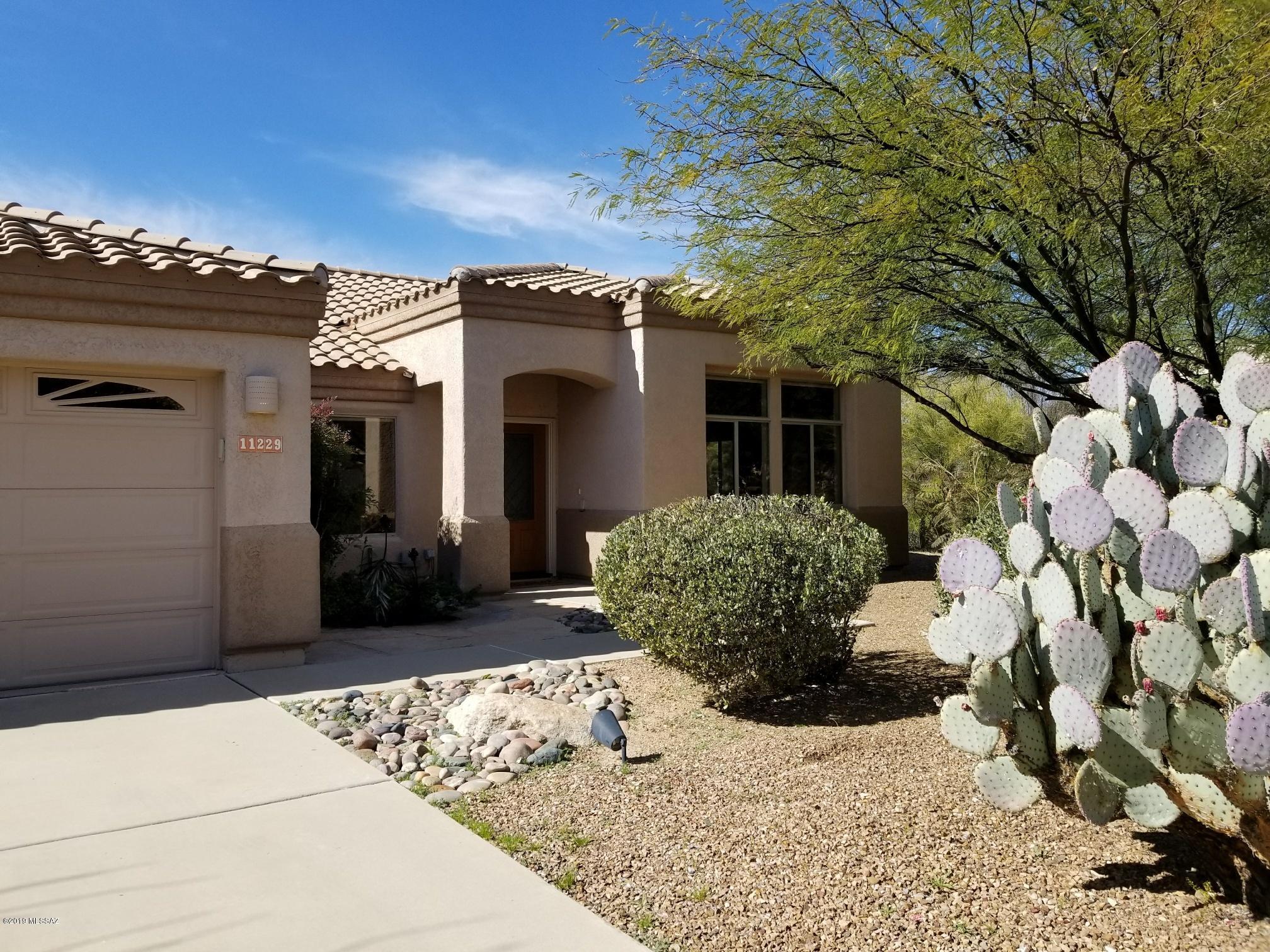 Fresh & Bright...And ready for YOU. Close to everything Oro Valley has to offer. Well maintained by 1-Owner for 20 years. Naranja Ranch home on 1/3 acre affords seclusion, 4BR/2.5BA w/2400+sf. Great room, dining and living room can have multi-purpose uses such as home office or media room. Lush landscape blocks nearby neighbors from backyard and refreshing pool, spa and rock waterfall to enjoy. Low monthly HOA fees only $200 annually. Walnut hardwood floors in many rooms & traffic areas. In home humidifier for floor maintenance. Separate Custom tiled shower in Owner's suite. Spacious yard for multiple gardening areas w/custom planter beds and Flagstone walkways. Polybutyline plumbing replaced Jan/2019. Close to shops,library, and schools- Wilson K-8 and Ironwood Ridge HS. Welcome Home!