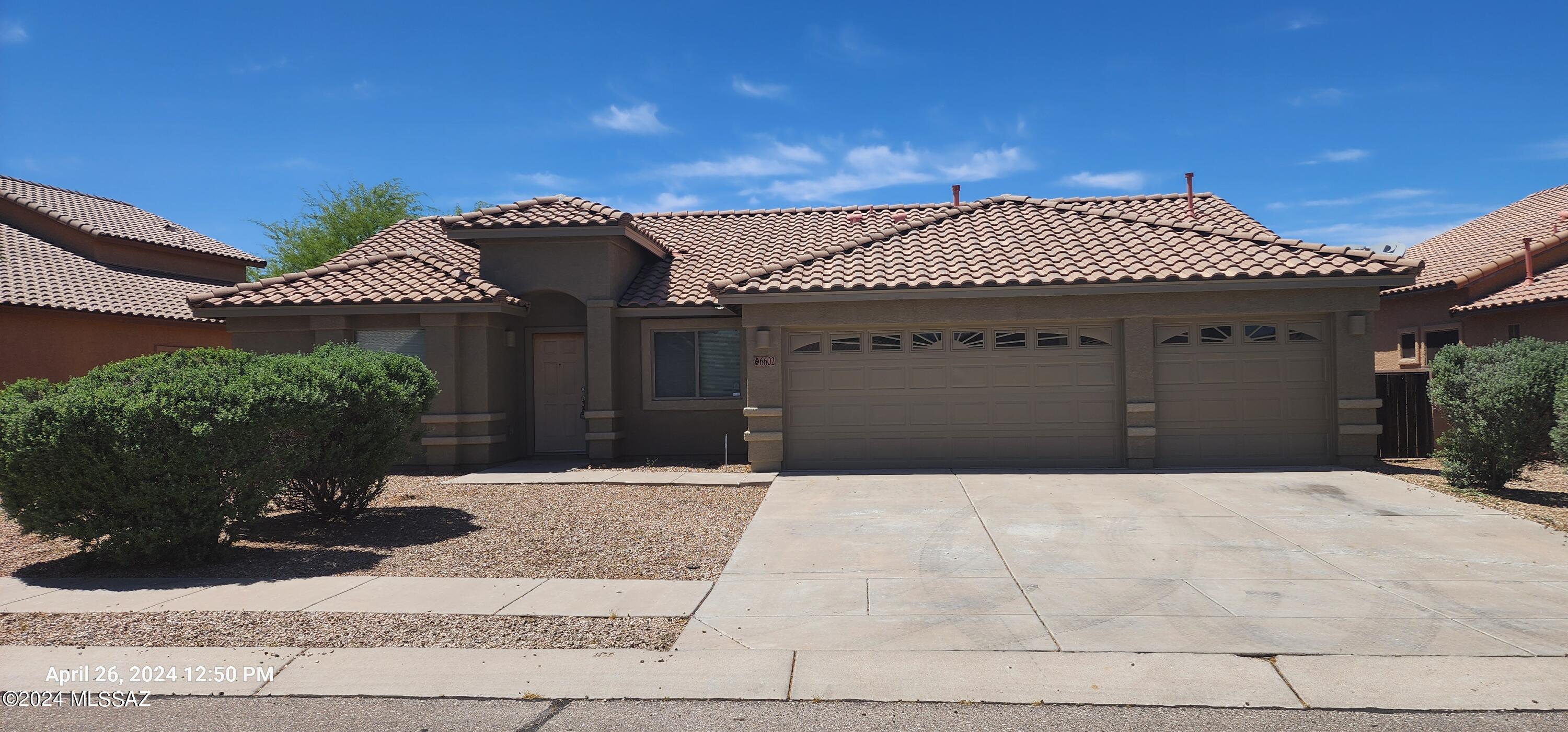 Conveniently located 4 bedroom 2 bath home located near Raytheon, UA Tech Park, DMAFB, Amazon. Enjoy the spacious kitchen perfect for culinary adventures. Home boast a split bedroom floor plan, large 3 car garage, newly  painted exterior, neutral two tone interior paint, and pool sized back yard. Don't miss out on this opportunity to make this your home.