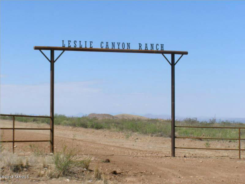 923+/- ACRES  - Leslie Canyon Ranch for SALE.  Now less than $900 per ACRE for beautiful LAND. Super high water table area!  The state came down to inspect both wells.  The one with the windmill has a solar powered submersible pump and first water at 79 feet!  The other non-working windmill only has a casing but water at 96 feet.    Power is on part of the ranch. Higher in elevation makes for a nice year-around climate. 5 miles off the hwy 191 on a county maintained road.  Slightly rolling terrain - EASY ACCESS. FANTASTIC MOUNTAIN VIEWS. Newer MFG Homes allowed. The perfect HORSE PROPERTY!  The seller is recombining all parcels & will have a grazing lease in place.  Possible Seller Financing available.  Seller might consider a split.