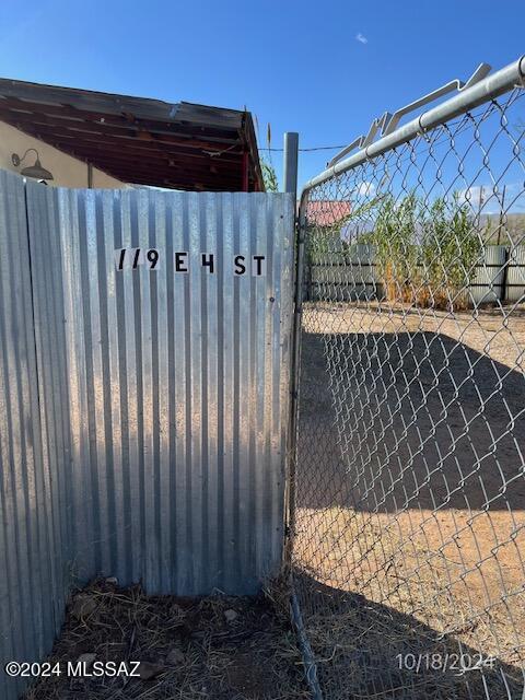 Hudhomestore.gov property available. Corner lot, two bedroom, one bath southwest style bungalow, tile floors, adobe walls, tankless hot water heater. Fixer upper with no appliances, no Sellers Disclosure. Call listing agent for access infor.