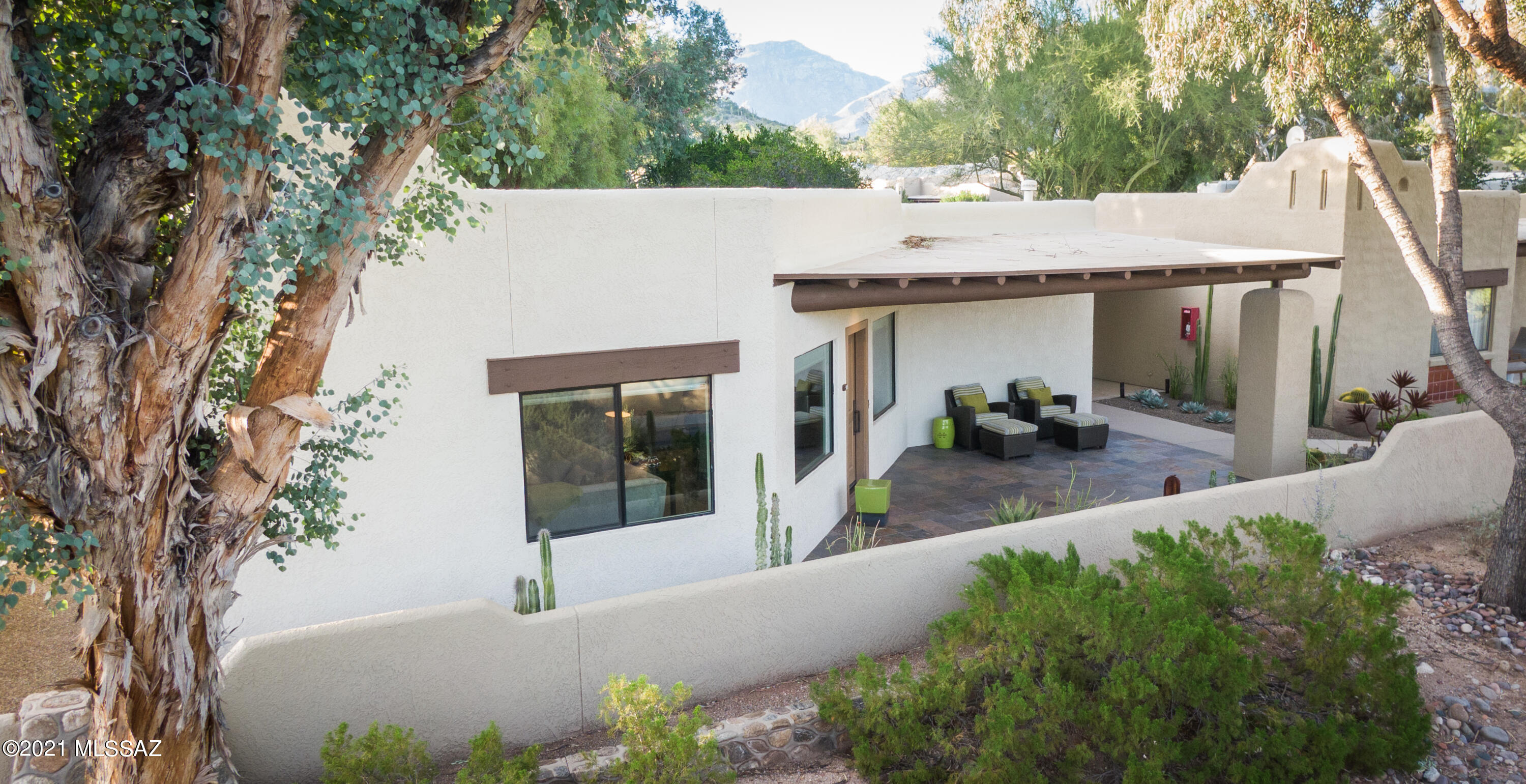 Enjoy the tranquility of this contemporary designed casita located on the pristine grounds in the heart of the world renowned Canyon Ranch Wellness Resort. First place design award by American Society of Interior Designers. Walking distance to the two-mile loop trail, Sabino Creek, tennis courts, swimming pools and the state of the art Spa and beauty salon. Windows and the patio  invite the peaceful majestic Catalina & Rincon mountain views in your living room. Brightened by skylights at the kitchen & bathroom. . Enjoy year around hiking, cycling and various outdoor activities. Round the clock fitness and wellness classes taught by dedicated experienced staff. Enjoy Dining at the two venues offering healthy gourmet dishes.

Make your casita into a resort living healthy vacation destination or your permanent sanctuary 
A guard-gated community. This casita is offered furnished with few exclusions. Personal Items included in a separate Bill of Sale.
Resort Membership fee $990/month reflected as Rec. Fee. Ask agent for details.