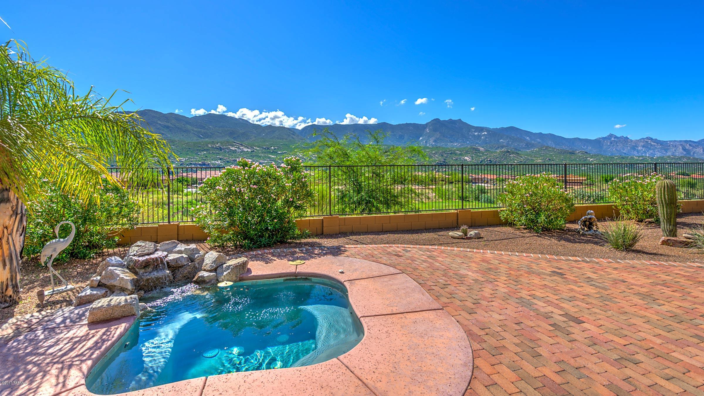 Spectacular, panoramic, unobstructed, east-facing mountain views from this CATALINA floor plan in SaddleBrooke’s Preserve. Oh, and it’s on the golf course, too! Just some of the home’s features: side-load, 2-car Garage + separate, single-car Garage. Guest Casita. In-ground Spa w/waterfall. Gated courtyard. 8” crown moldings. 4” plantation shutters. Kitchen has stainless GE Monogram double ovens, brand-new refrigerator, gas cooktop, slab granite countertops, large center island & huge picture window which perfectly frames the golf course & the Santa Catalina Mtns. Lots of large windows along back just add to the light & bright feel, not to mention the views which can be enjoyed from almost everywhere inside. Exterior was painted in 2016. This is a one-owner home, only lightly live