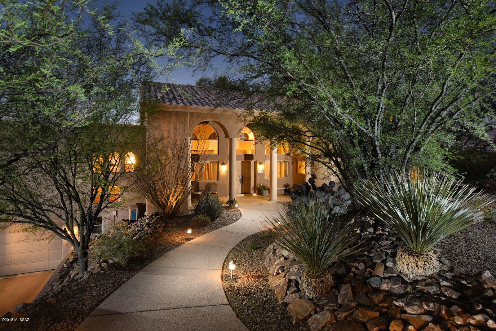 Beautiful outdoor fenced and gated pool/spa area. New, energy efficient HVAC units and water heaters recently installed. Home is move in ready, has been updated with high end finishes(travertine /granite) and has been impeccably maintained inside and out!Minutes from I-10, this spectacular custom home , made w steel, sits on 3.7 acres in the Tucson Mountains, with no HOA. This wonderful home features all primary living areas, including 3 of 4 bedrooms and 2 of 4 bathrooms on the main level. The master suite stands alone on the 2nd floor and is a TRUE SANCTUARY! Step through double doors into a very large bedroom with a sitting area, enjoy a 3 way gas fireplace and a spa-like bathroom with a double vanity, walk-in shower and a large soaker tub. You will love the HUGE master closet and the amazing views from the expansive balcony! The 900 sq. ft. finished bonus space is perfect for a home theater, game room, office, etc., and is adjacent to the 3-car over sized garage.