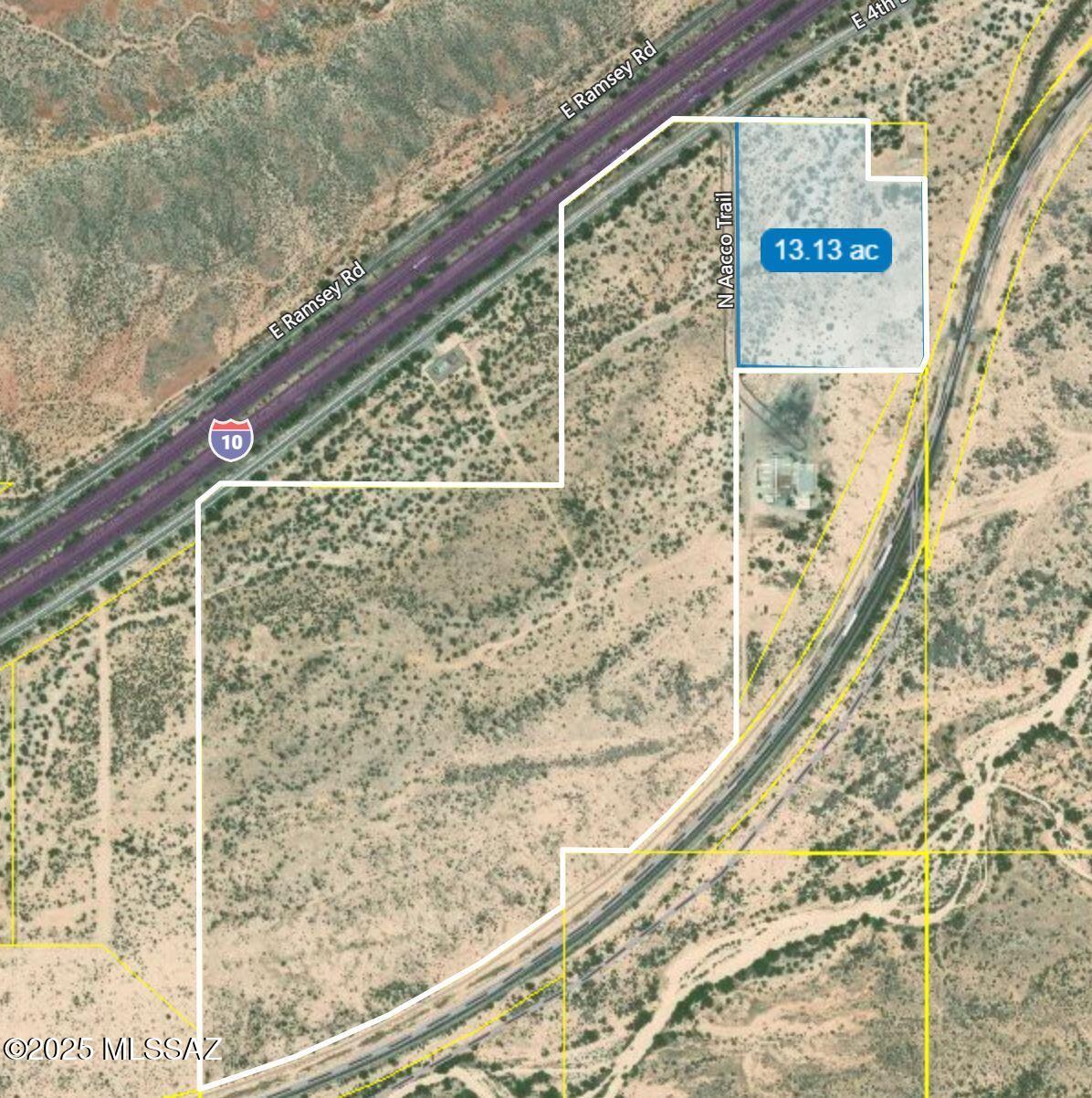 Flat land on I-10 paved frontage road. Ideal for home site with potential for property lot split.  Electric to property line.  Drill well for water and install septic.