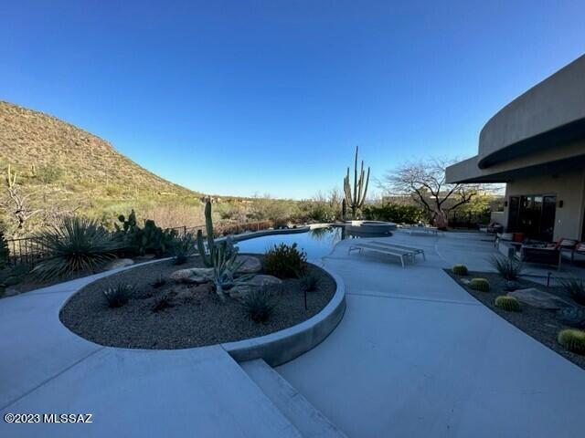 * CONTEMP ELEGANCE* STUNNING ESTATE NESTLED IN THE FTHILLS OF TORTOLITA MTNS...OVERLOOKING '' GALLERY NORTH COURSE'' NEW HOME OF  ''LIV GOLF TOURNAMENT' LUSH DESERT TERRIAN- SOARING SAGUAROS, ROCK OUTCROPPINGS...SURROUND THIS DESERT MASTERPIECE! NEWLY REMODLED- ALL DESIGNS BY MARC SOLOWAY...TAKES ON A TOTAL MODERN FEEL! COMPLETLY RENOVATED BKYD- GORGOUS POOL/SPA, BUILT IN BBQ, SEVERAL SITTING AREAS, WATERFALLS, FIRE FEATURES CREATE A DRAMATIC SETTING! INCREDIBLE GOURMET KIT- GRAY CABINETRY, SUBZERO/WOLF & MIELE APPLIANCES- EVEN BUILT IN EXPRESS MAKER, WATERFALL QUARTZ CTRS...OPENS TO GATHERING RM- -MODERN PRIMO 72'' LINEAR GAS  FP, WALLS OF GLASS BRINGS OUTDOOR IN! FULL BLOWN MEDIA ROOM- STADIUM SEATING, 4 EN- SUITE BRS, BRAND NEW PRIMARY BA, HEATED/COOLED 3 CAR GARAGE-LIST OF UPGRADES ATT