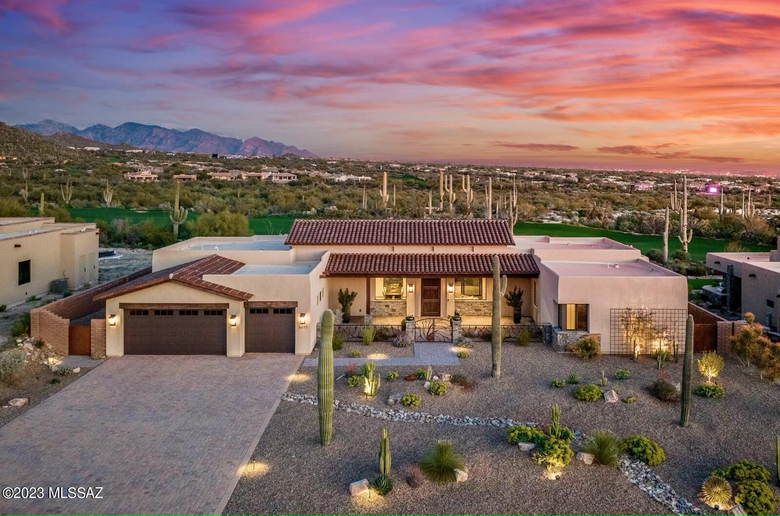 Luxurious Home with Tranquil Outdoor Space. Nestled in the highly exclusive and private community of Ritz Carlton Residences. This well designed layout features 3BR/3BA.  Meticulously designed to satisfy the most discerning style preferences. Richly fashioned with Santa Barbara architectural elements, the exterior captures your imagination with low-maintenance desert landscaping. Unique desert species  generously effused around the grounds with blooming flowers.  Encapsulating sheer beauty as you walk in and see the jaw dropping Sonoran dessert surrounding the Ritz Carlton Golf Course which his meticulously maintained.  Interior features an organically flowing floor plan, high ceilings, a rich color scheme, and an open concept indoor outdoor living spaces with dramatic mountain and golf course views. Overlook the meticulously manicured 3rd Fairway of the Dove Mountain Golf Course. Fashioned for those who entertain with exacting standards, the fully enclosed backyard includes a patio retreats with soothing water feature and outdoor BBQ. Pure bliss is realized in the oversized primary suites with walk-in closets. Two master suites  abundantly sized for guests with a generous office/den or hobby room.  Other features: attached 3-car garage & laundry room.  Multiple membership types available to cater to many lifestyles.  Concierge service is available with each home for the ultimate luxury experience.  Come and make Arizona your permeant or second  home that feels like a permanent vacation. Membership included with purchase. Ask about Ritz Carlton Hotel perks that also come with membership for those who reside in this community.  Visit https://theresidencesdovemountain.com/golf/ for more information about amenities and community.