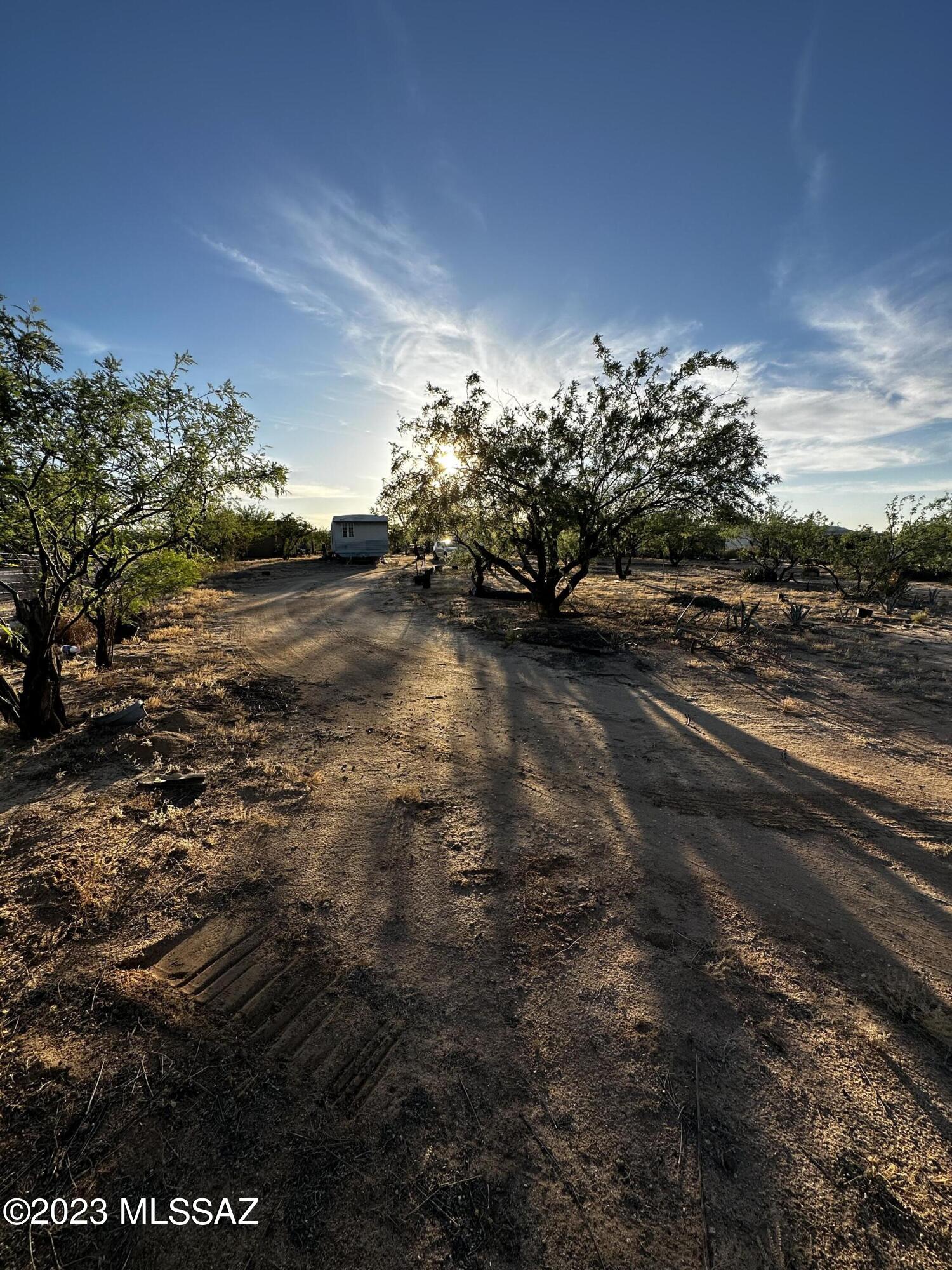 Versatile Potential: This generous improved 1-acre expanse, offers boundless possibilities for the discerning investor or aspiring homeowner. From building your dream custom residence,  renovating the existing mobile home on property, or placing your manufactured home. Create your own personal Oasis, plant a nursery, raise your own livestock. Make this yours today! 15 minutes away from the I-10