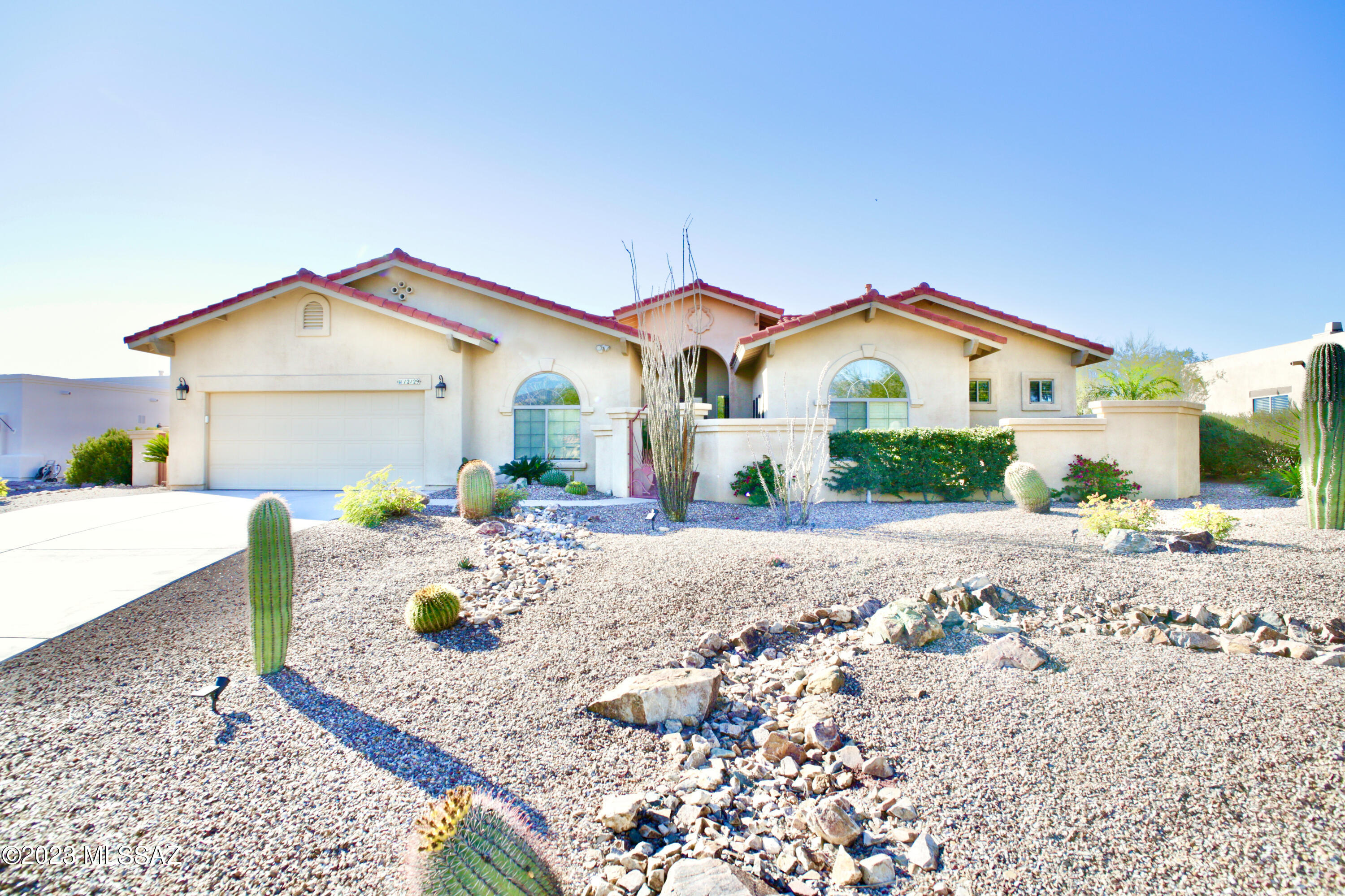 *** Please note this house is only available for stays 90 days or longer*** 
Discover this exquisite 5-bed, 2-bath home in Reflections Ridge, Oro Valley. With 11-ft ceilings, stunning millwork, and plantation shutters, it radiates elegance. The serene color palette sets a tranquil tone. Enjoy resort-like amenities, including a heated pool/spa with a soothing waterfall. Adjacent to it is a charming fire pit deck, perfect for relaxing evenings. This custom home embodies luxury and comfort, leaving no detail overlooked. Contact us for Rates Jan through April as they are higher.