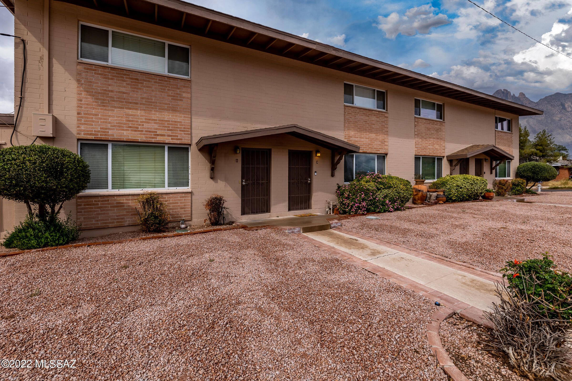 Move-In ready Condo-Available now! Remodeled with New Heater (2018), Newer Flooring, New Carpet (2018), A/C recently Serviced & Work Well, with all wok performed on home by licensed contractors w/Approval of HOA. Home is Conveniently located in Central Tucson. Close to Shopping and a short 10 min drive to UofA.  All Appliances Convey (Washer/Dryer, Refrigerator & Counter Microwave, Private patio, Jack and Jill full bathroom upstairs, Powder Room downstairs, Walk-in closets. Both Bedrooms are substantial in size. Large workable space in kitchen. Convenient 1/2 bathroom downstairs. Community pool and even a Large clubhouse available to rent for gatherings. A must see!