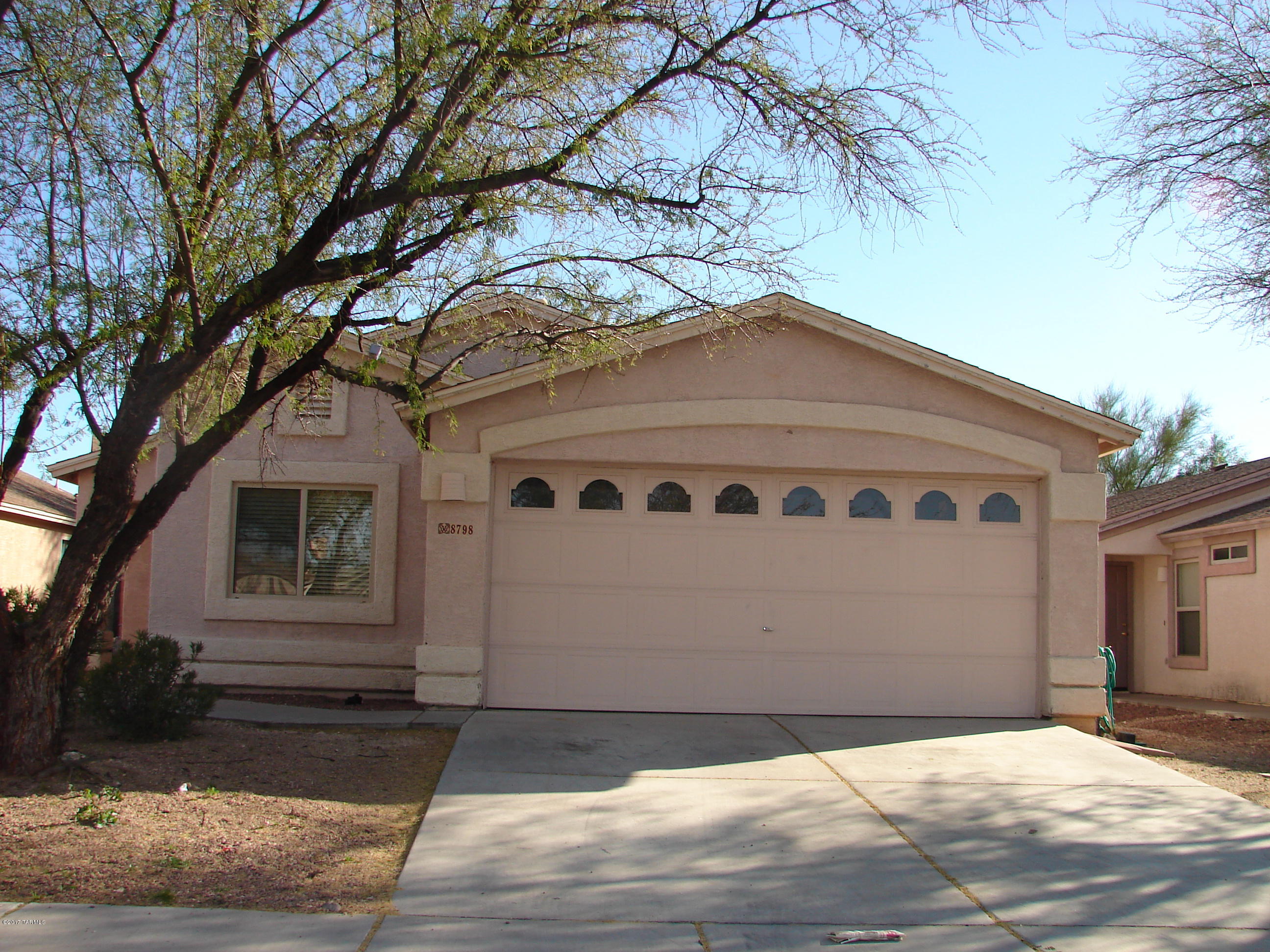 Don't miss this cute house that is ready for its new owner! Located in Rita Ranch, this home features 1318 square feet, 3BRs/2BAs, slate flooring in all high traffic areas with carpet only in the bedrooms. The kitchen is bright with a breakfast bar, pantry and all kitchen appliances included. The great room is spacious with sliders to the backyard. Ceiling fans all but one room & master bedroom has a walk-in closet. The backyard is shady and inviting plus you'll find a 2-car garage. Close to shopping this is a convenient location for any buyer.