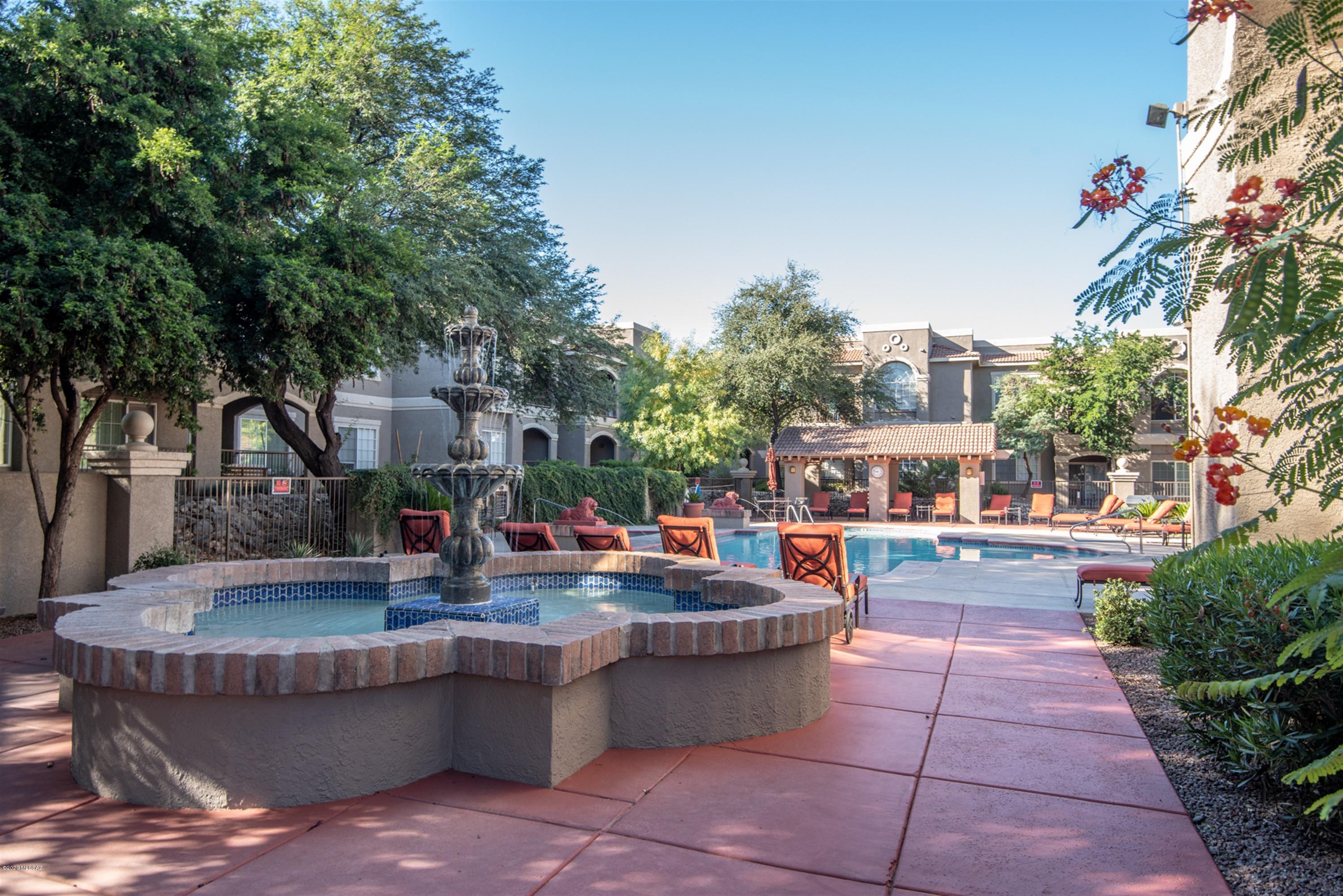 Remodeled ground floor condo in the luxurious resort style community of Boulder Canyon Condos.  This  charming Oro Valley condo features ceramic tile flooring throughout, covered patio with mountain views, an open layout, master suite with walk-in closet, kitchen with stainless steel appliances & granite counters and a convenient Northwest location near shopping, restaurants and Catalina State Park.  The Boulder Canyon Condos amenities include a heated pool & spa, spacious clubhouse, exercise facility, business center, bbq areas and professionally maintained grounds.