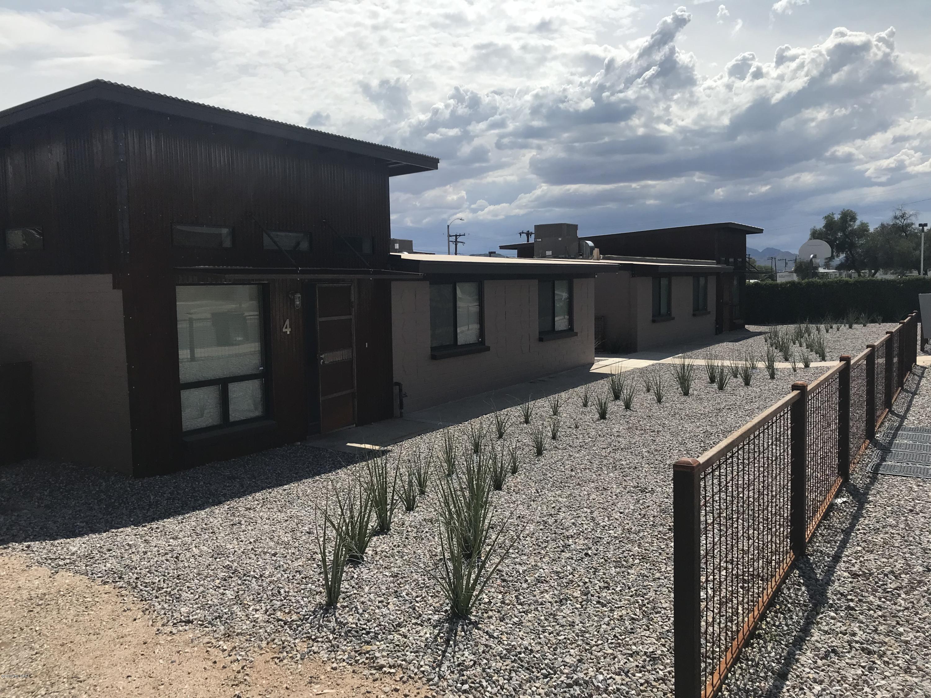 NEXT DOOR TO THE JUST COMPLETED U OF A NEW HONORS VILLAGE CAMPUS AND DORMS https://www.honors.arizona.edu/honors-village
AND JUST A COUPLE OF BLKS FROM THE U OF A MEDICAL SCHOOL/CAMPUS.AT  U OF A. THIS 5 UNIT COMPLEX IS COMPOSED OF 3 BEDROOM 2 BATH UNITS. ALL UNITS RENTED FOR $1,975 PER MONTH.. PROPERTY HAS  HAD A GUT REHAB WITH 5 NEW WATER METERS(SO NO UTILITY EXPENSES), CORRUGATED METAL SIDING, NEW ROOFS, KITCHENS, WASHERS/DRYERS, A/C UNITS WITH EXPOSED SPIRAL DUCTING, PRIVATE FENCED REAR YARDS, ETC.  SEE PHOTOS. RENTS CUIRRENTLY ARE AT $1.72 PER SF AND AVERAGE RENTS IN THE AREA ARE  $1.83 PER SFR OR $2,100 PER UNIT. SO GREAT UPSIDE