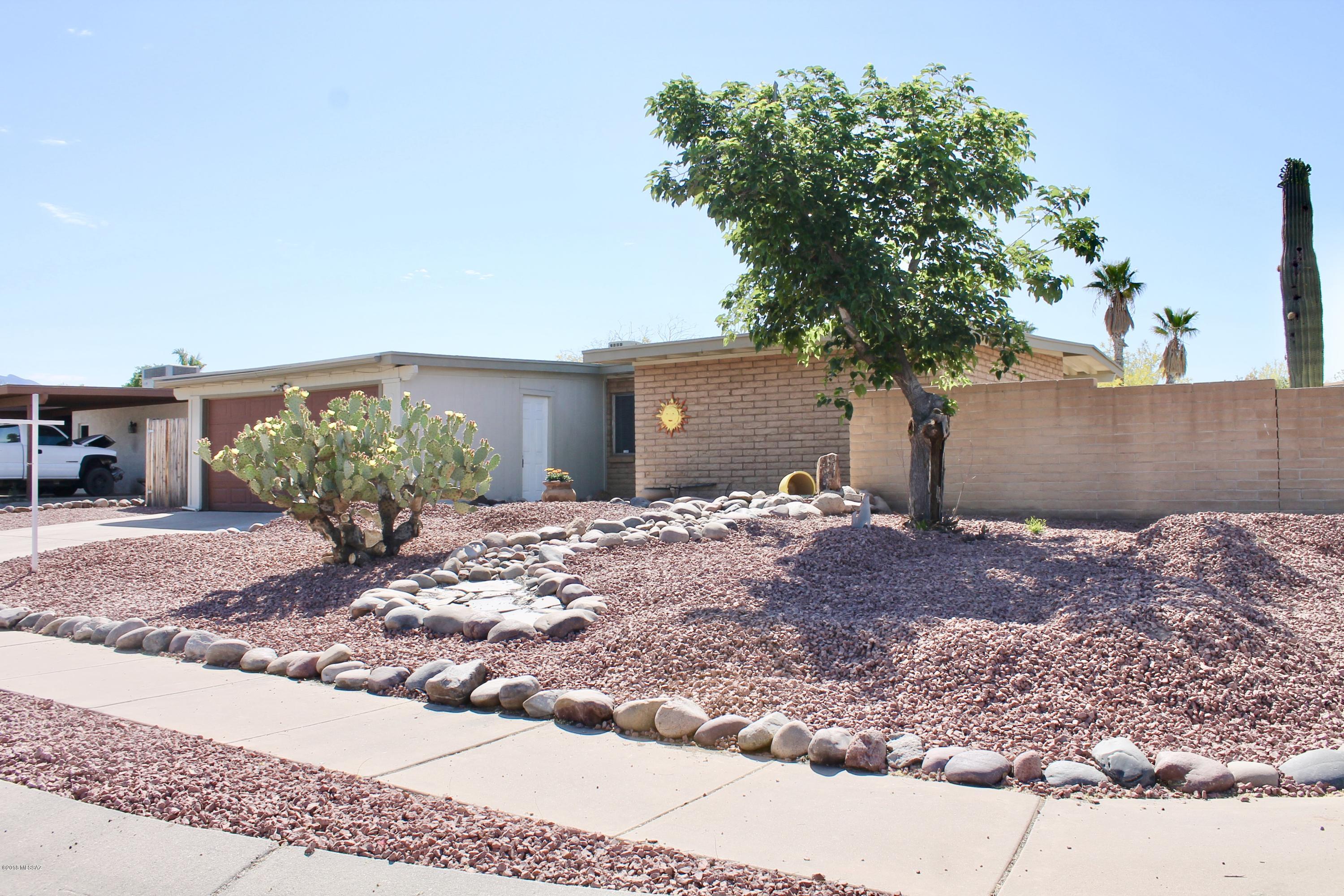 Huge corner lot (nearly 1/4 acre)! Sparkling blue pool in large backyard with fence that splits from the pool area to the side yard.  Plenty of space under the back patio for entertaining!! Newly remodeled, modern kitchen with brand new stainless steel appliances, kitchen island, and new flooring! Guest bedroom closet has an awesome barn door. Both bathrooms have been beautifully remodeled as well!! You do not want to miss out on this house, it is move in ready and steps from a beautiful neighborhood park. Perfect location near shopping, schools, dining, I10, and much more!