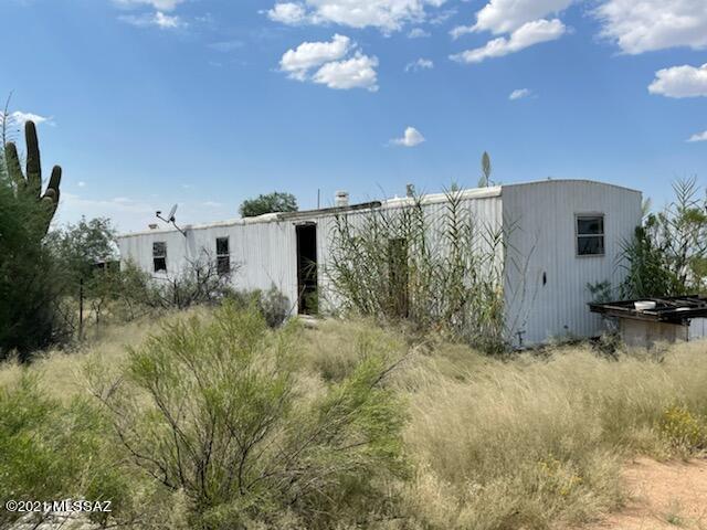 This is an amazing investor opportunity! This property has two manufactured homes on it and is set up for a family compound or the perfect buy for a great rental opportunity. Seller would like to sell this parcel and adjoining parcel 301-75-008M at the same time. 
Please see MLS #22124462
These manufactured homes have been vacant for some time and it is not advised to enter, please do so at your own risk. Buyers to be responsible for utilities and septic certifications. Property sold as is.