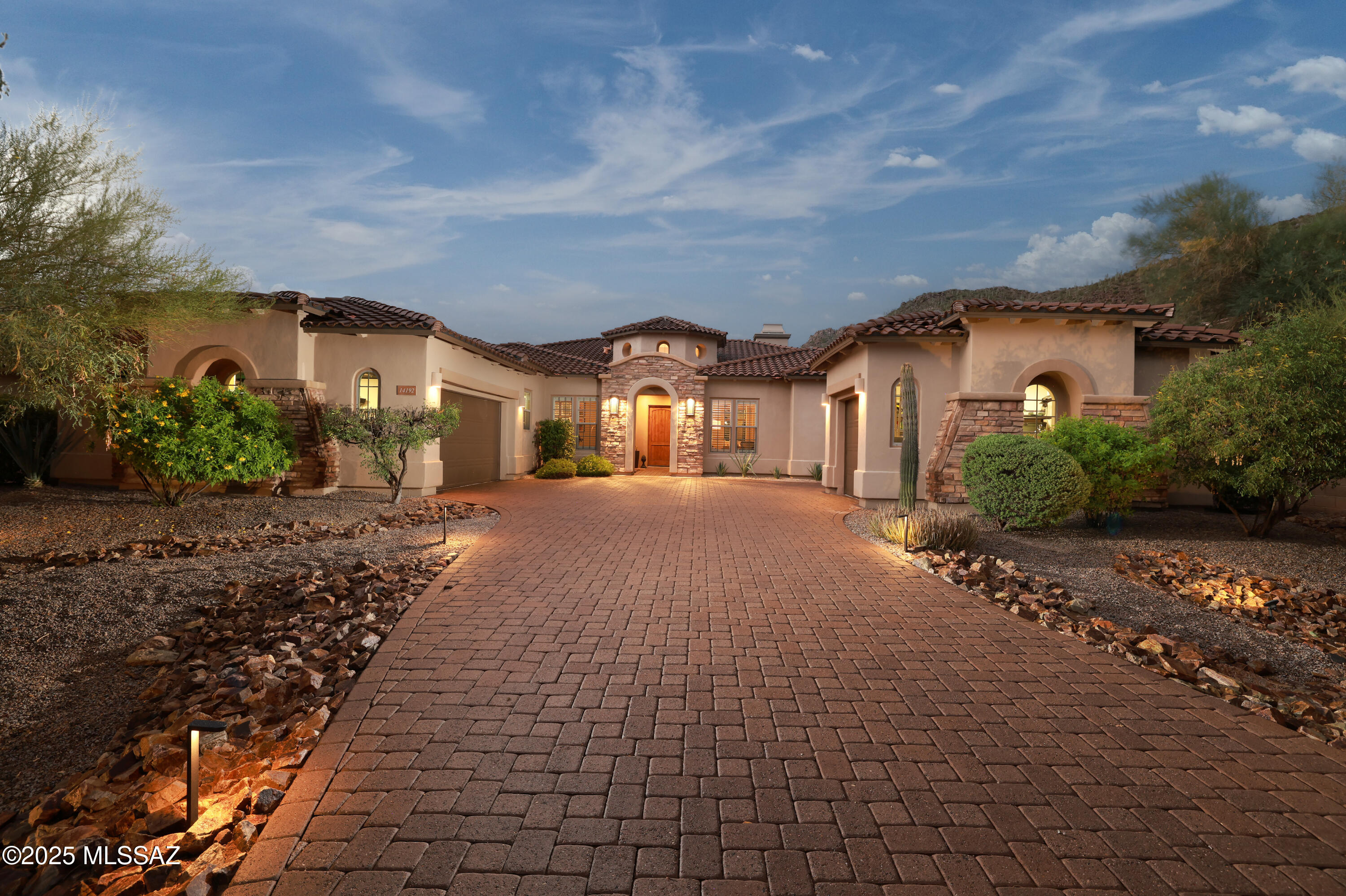 Discover serene desert living, and comfort in this expansive home while enjoying captivating Tortolita Mountain views.  Situated on the 17th fairway of The Gallery North course this Toll Brothers home combines timeless elegance with modern amenities all while offering spectacular views from inside the home and pool side. The renovated kitchen complete with counter level island is an entertainers delight. Boasting step-free, split bedroom layout, and generously sized rooms for both comfort and sophistication. Luxurious primary suite features grand entry, fireplace, sitting area, mountain views, two walk in closets, and exquisitely remodeled ensuite. Prepare to fall in love with this well appointed home.