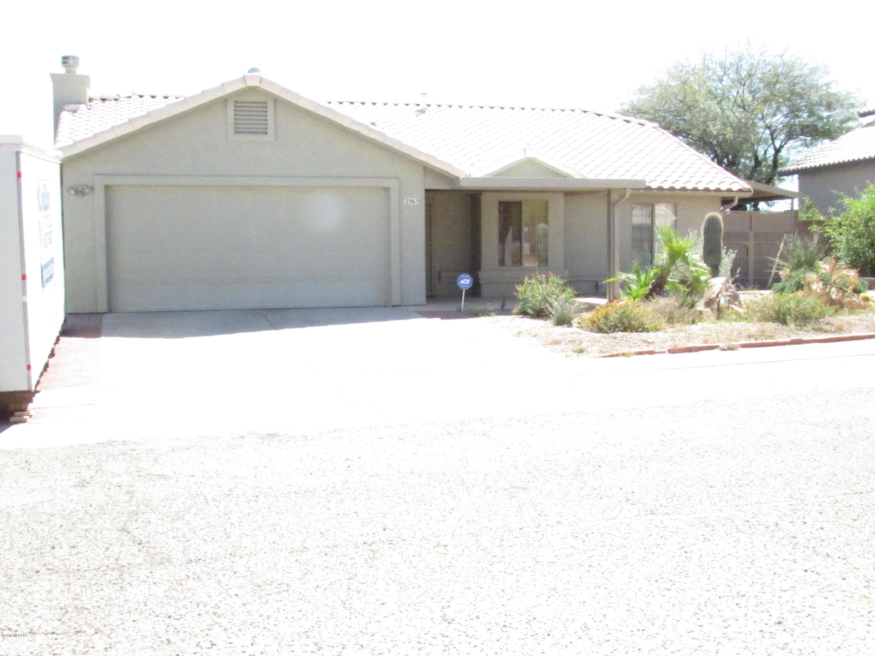 You will fall in love with this 3 Br, 2 Ba home that hosts slate floors, 2 Br W/ Bamboo floors,Hunter Douglas window coverings,water saver commodes, track lighting, ceiling fans, disposal, full kitchen sink, roll out shelves in all the kitchen cabinets, tankless hotwater heater, A/C and furnace in 2015.Drip Irrigation, extended covered driveway W/storage 8X12. Extended covered patio W/ 7X7 storage.