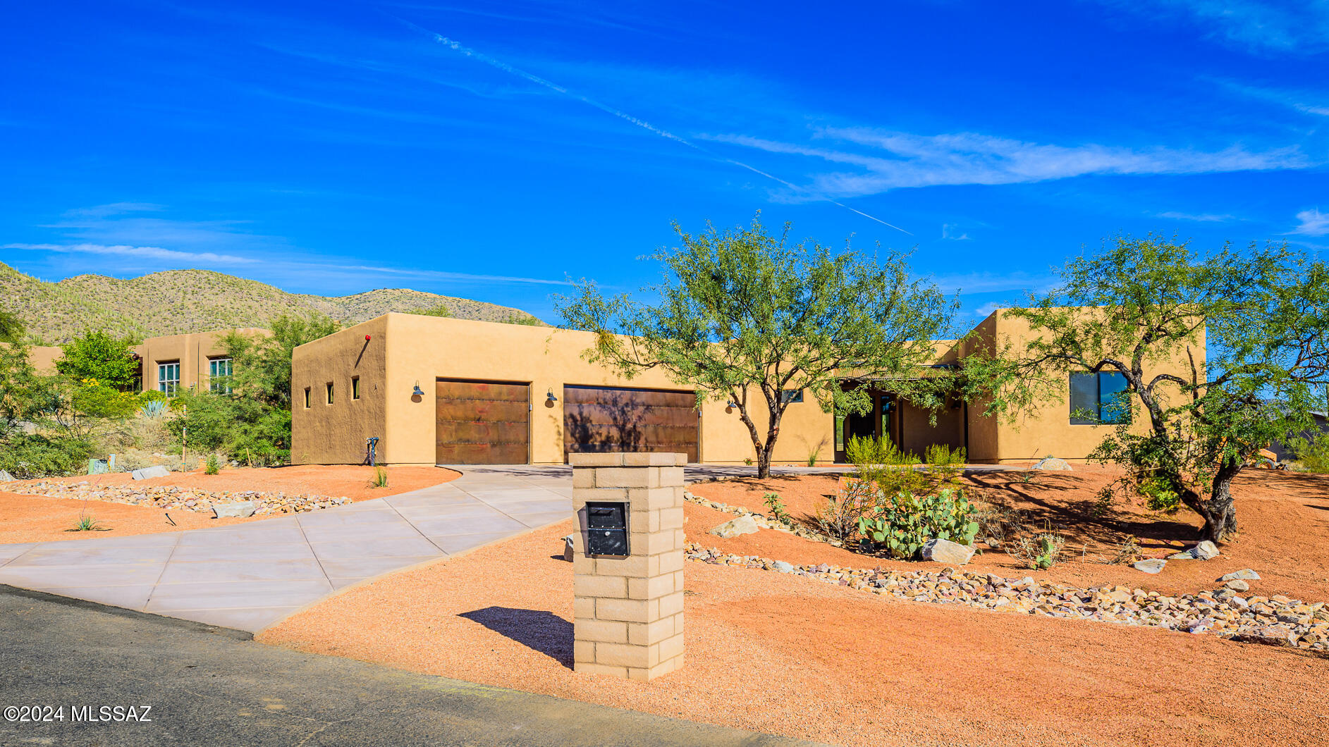 Welcome to this exquisite 3000 sq ft new home built by the renowned TJ Bednar, nestled in the prestigious Sabino Highlands gated community. Situated on an expansive 0.83-acre lot, this stunning residence offers modern amenities. Owned Solar Power with a cutting-edge 8.2 KW Photovoltaic System, NO LEASE. Dual HVAC units eco-friendly features, spacious living. 4 Beds, 3 Full Baths plus den Including two primary suites one w/separate entrance, each offering a private retreat, and spa-like en-suite bathrooms, ideal for multi-generational living or those who simply appreciate extra space Spacious Great Room boasts high ceilings and wet bar Gourmet Kitchen premium finishes, modern appliances, and a large central island plus a butler's pantry, gorgeous tile flooring as well