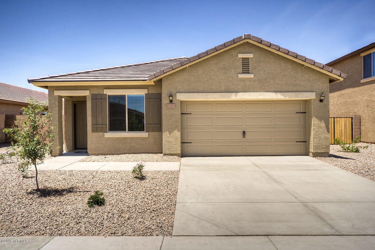 The Prescott floor plan includes more than $10,000 worth of upgrades including energy efficient kitchen appliances, granite countertops, custom wood cabinets, brushed nickel hardware and a an attached two car garage. The Prescott showcases a master suite complete with a walk-in closet, as well as a separate den, a fully fenced backyard, a covered patio and front yard landscaping. This spacious, 3 bedroom, 2 bath home is located within the amenity-rich community of Sonoran Ranch. Dispersed throughout the Sonoran Ranch community you will find miles of walking trails, as well as a park with a children’s playground and a spacious picnic area, creating an extraordinary lifestyle for you and your family!