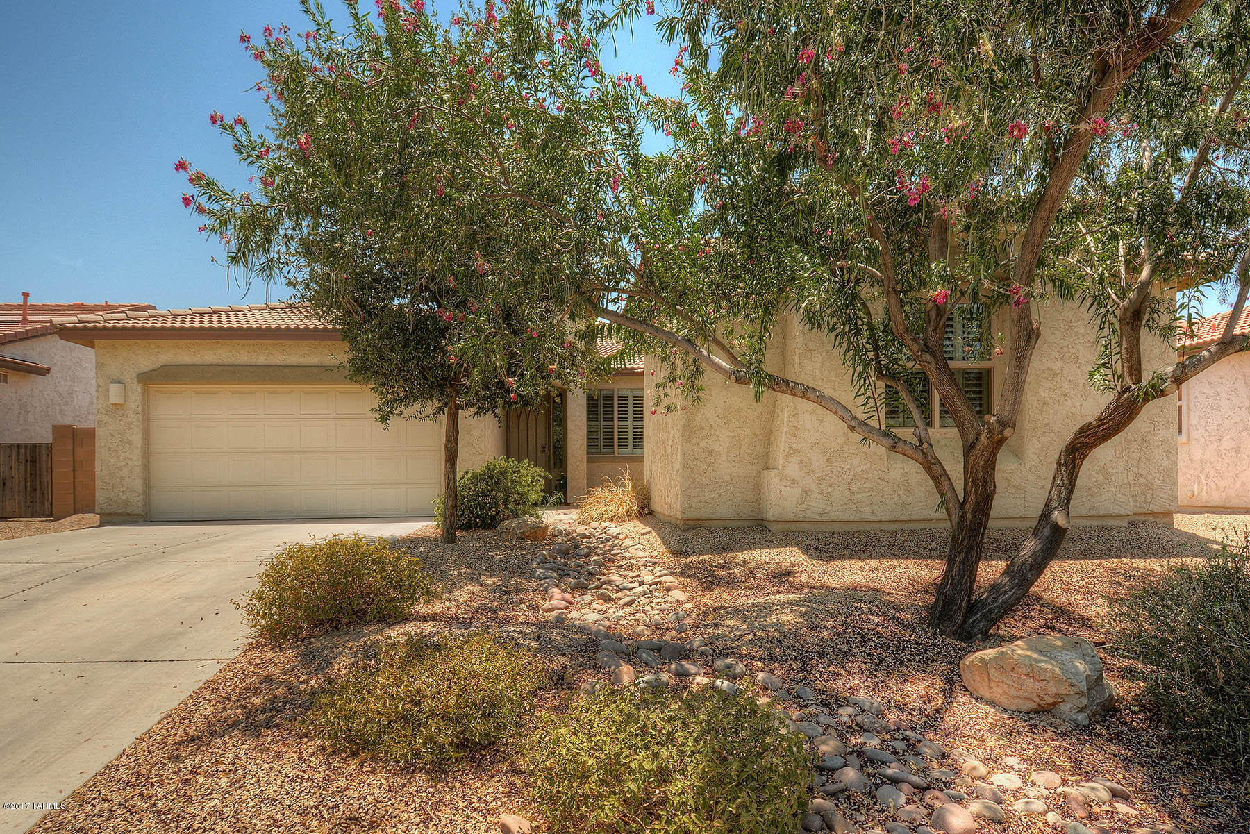 Must see this beautiful newly updated, ''model like'' home in the sought after subdivision of Gladden Farms. This 4 bedroom 3 bathroom home also includes a casita with a private entrance. Enter this large open floor plan through the grand foyer.  Gorgeous kitchen complete with granite counter tops, beautiful back splash & top of the line cabinetry. The large backyard is great for entertaining with a covered patio, pool, spa and built in bbq. Enjoy the community parks and walking trails along with easy access to I-10.