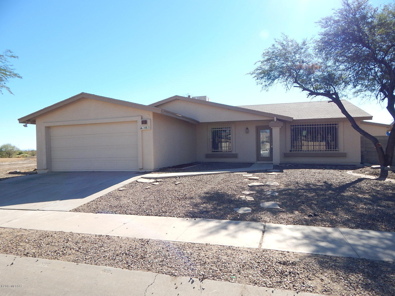 PRICE JUST REDUCED! This is a Fannie Mae HomePath property. With 1619 sq ft of living space this home has 3 bedrooms, 2 bathrooms, laundry room, & large backyard with covered patio great for entertaining. Enjoy the spacious kitchen with plenty of cabinet space & breakfast bar. Master suite with walk-in closet, master bathroom with dual sinks, garden tub & walk-in shower. <FONT COLOR=RED>Recently painted interior with two tone paint, installed NEW carpet, NEW oven/stove, NEW microhood & NEW dishwasher. </FONT> Located close to I-19, restaurants, shopping, schools and much more! Attention First Time Buyers: complete the HomePath Ready Buyer homeownership course, attach certificate to offer and request up to 3% closing cost assistance, ask Agent for more details, restrictions apply.