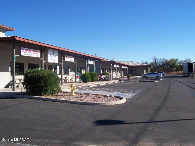 Two commercial office buildings with nine retail businesses and five mini storage building (309) individual units total retail units 318