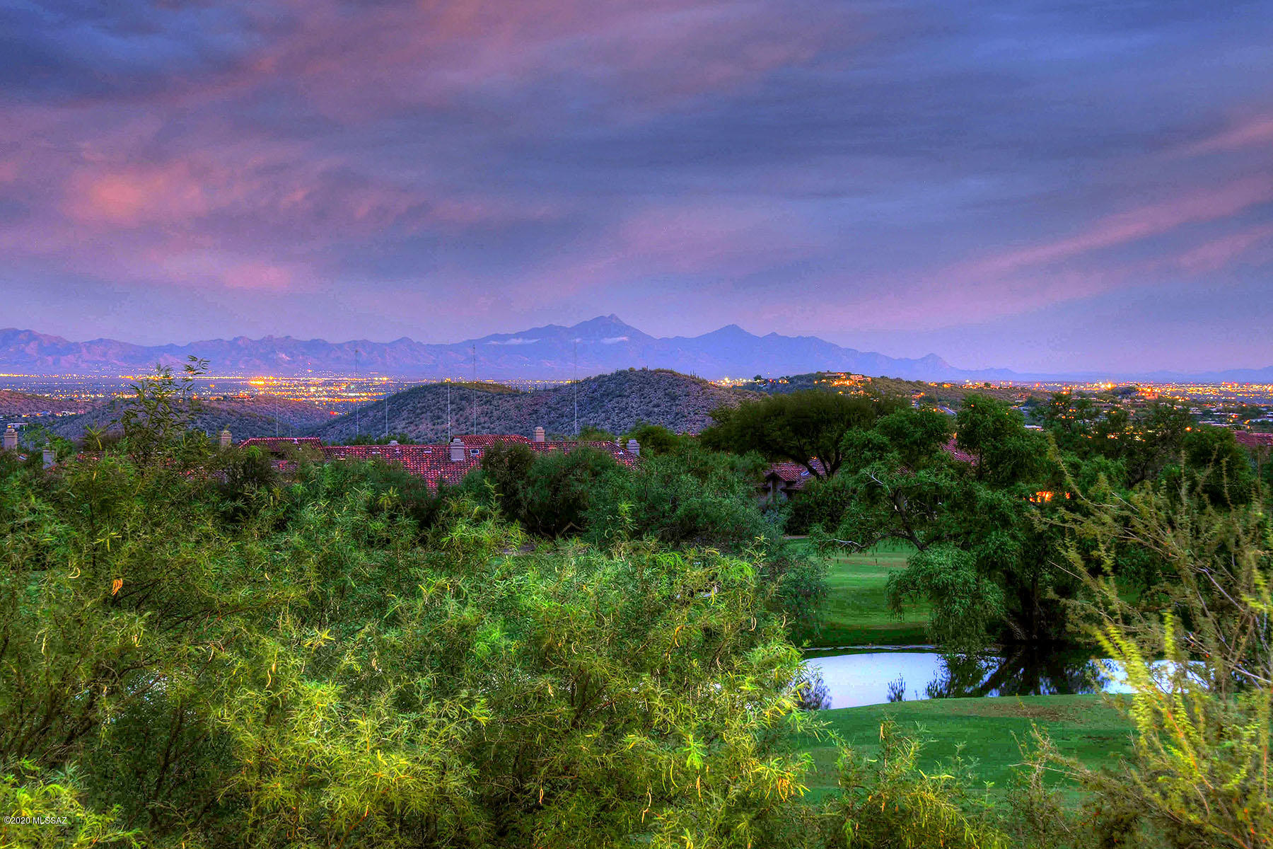 Framed by Ventana's beautiful golf course this Classic Contemporary home is situated on a private lot with beautiful lake, mountain & city views. Phenomenal interior and built with the highest quality materials. Gallery foyer and walls of glass in the living room showcase the gorgeous surroundings. Dream kitchen features large island with wine cooler & ice maker, Subzero & Dacor appliances. Main level has all essential amenities of everyday living. Generous formal dining room perfect for dinner parties. Resort worthy master suite includes bonus area w/built in seating & extra room perfect for office/exercise. Glass stairway leads to second level offering extra loft space & en-suite bedrooms. Flagstone surrounds refreshing pebble tech salt pool. Exceptional pristine landscape!