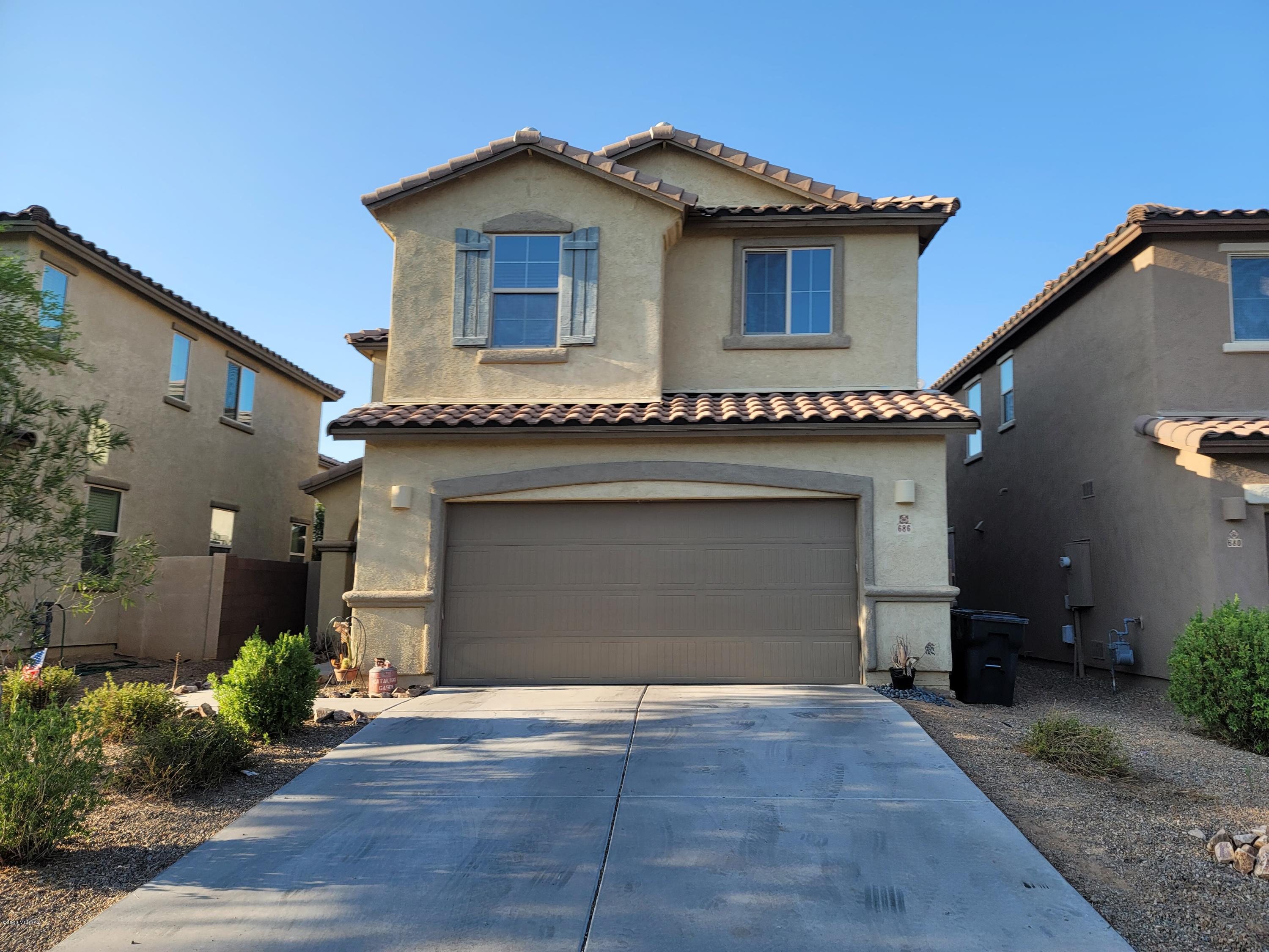 Lovely two story 3 bed/2.5 bath home in the prestigious Rancho Sahuarita. Home boasts open floorplan for entertaining & in ceiling surround sound. Smart garage door opener. Ceramic wood like tile on 1st floor. Lovely kitchen with center island, granite countertops, stainless steel appliances & upgraded expresso cabinets. 2nd floor includes a large loft & the laundry room. The large master suite with master bath includes walk in closet, dual sinks, garden tub & a separate shower. Private backyard with block fence beautifully landscaped with artificial turf, pavers & covered patio with BBQ grill propane connection. New Washer/Dryer/Fridge only convey with asking price or higher. Perfectly located only a few blocks from the Northern community park and pool. Check this beauty out for yourself!
