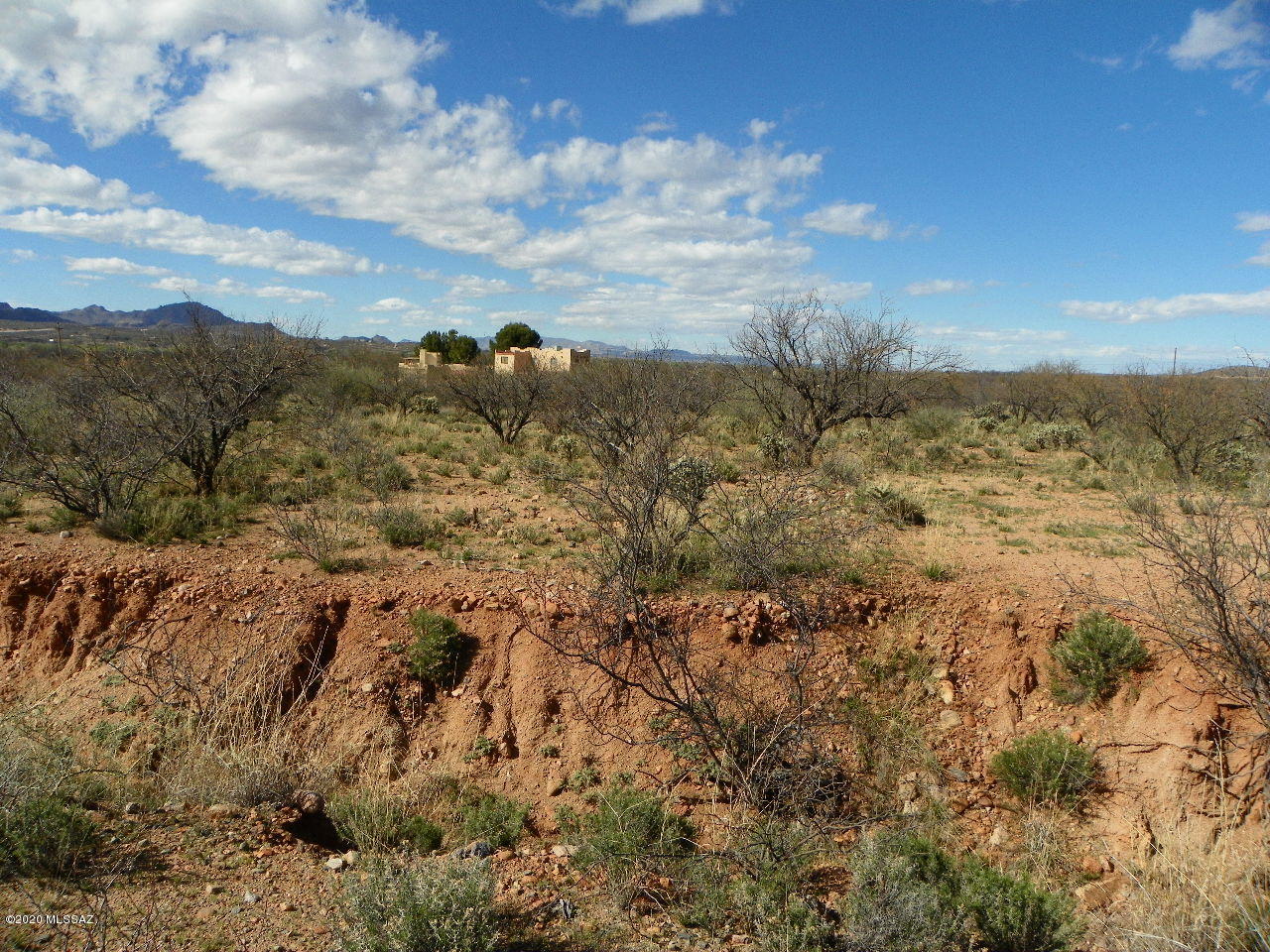 Residential building lot with a gentle slope, the very back end of the lot goes into a wash but the front is buildable.  Mountain views.