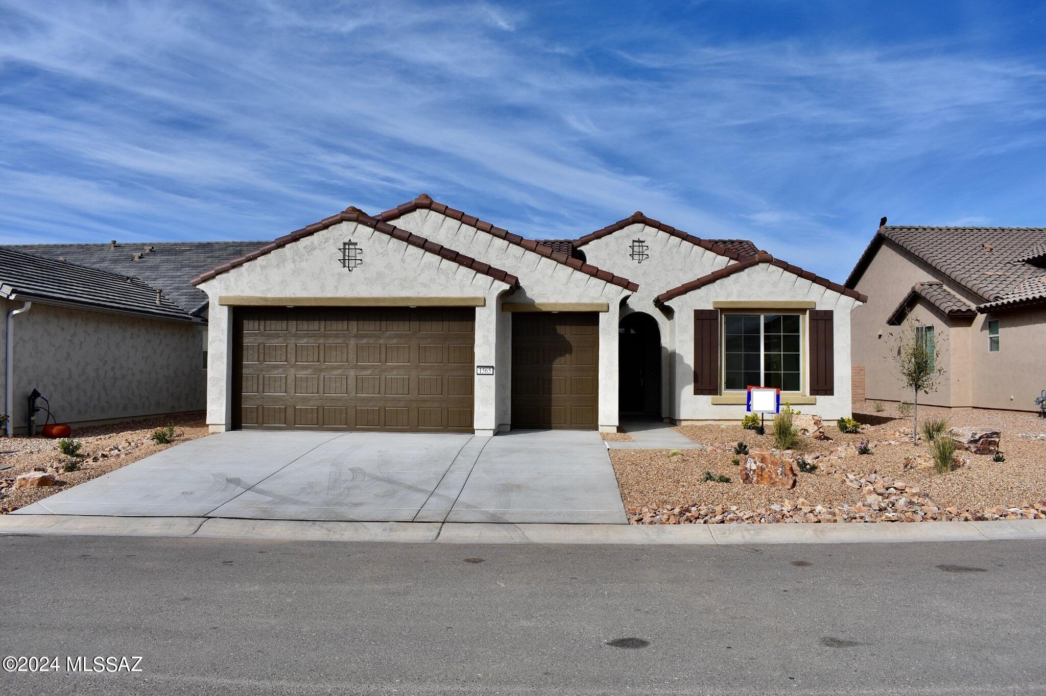 Quick Move In ''Agave'' home. Beautiful designer touches throughout. Home is bright and open. Spacious kitchen with quartz countertops, alternate kitchen island, and bay window at dining, LG stainless appliances, 41'' alder cabinets. Two-tone paint throughout, laundry room with upper cabinets. Master suite has a walk-in shower, and spacious closet. Extra room is a den, home has a golf cart garage, landscape and so much more! Come and live in a luxury resort community!