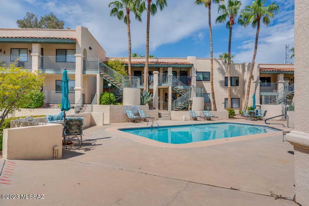 Range Pricing. Seller to accept or counter offers $160,000-$170,000. Rare opportunity to own this first floor refined, bright 2-bdrm, 2-bath in prime location within the complex. Just steps from the heated pool, spa and clubhouse, enjoy the pool view from the private, full length covered balcony. Newer AC & water heater, plenty of storage, 2 walk-in closets, all appliances stay, including washer/dryer. Some furniture included. HOA fee includes, water, garbage, exterior maintenance, roof, pest control, streets.