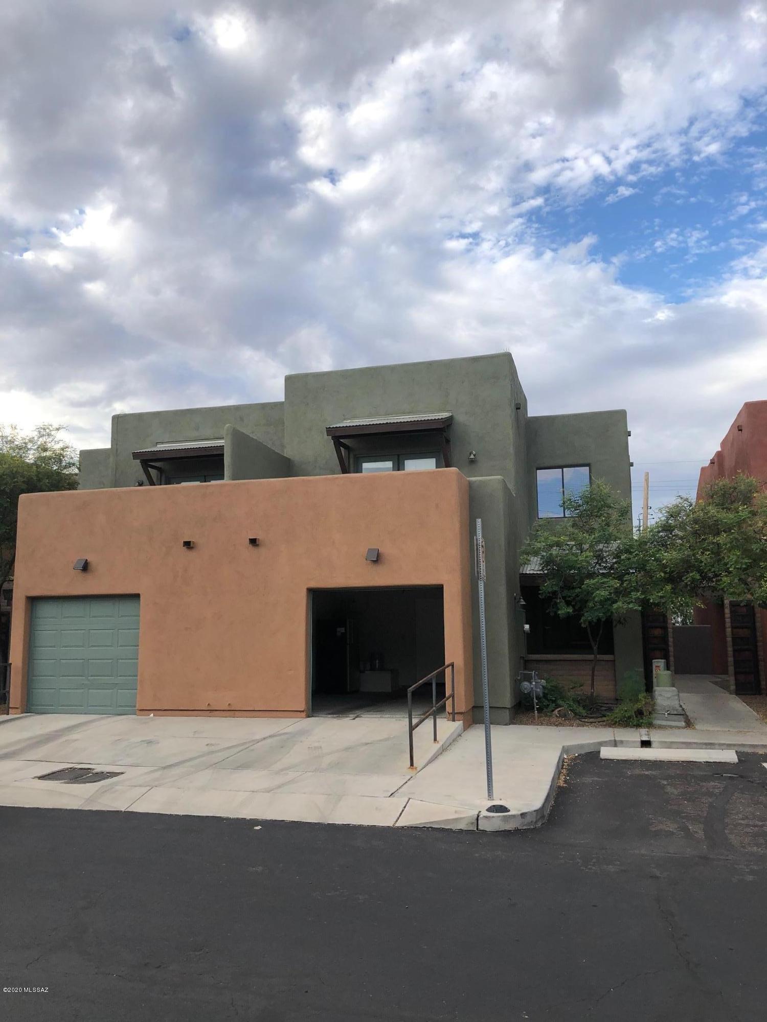 Like new Home in an upscale, quaint community within 2 miles of the University of Arizona, UMC and much more.  Quality features include granite kitchen counters, stone floor entryway, solid core interior doors and french exterior doors.  This adorable property has new cooling 
/heating, interior paint, carpet/pad and refrigerator/dw/micro.   HOA includes garbage collection, sewer, pest control and outside maintenance of units, including front yards.
