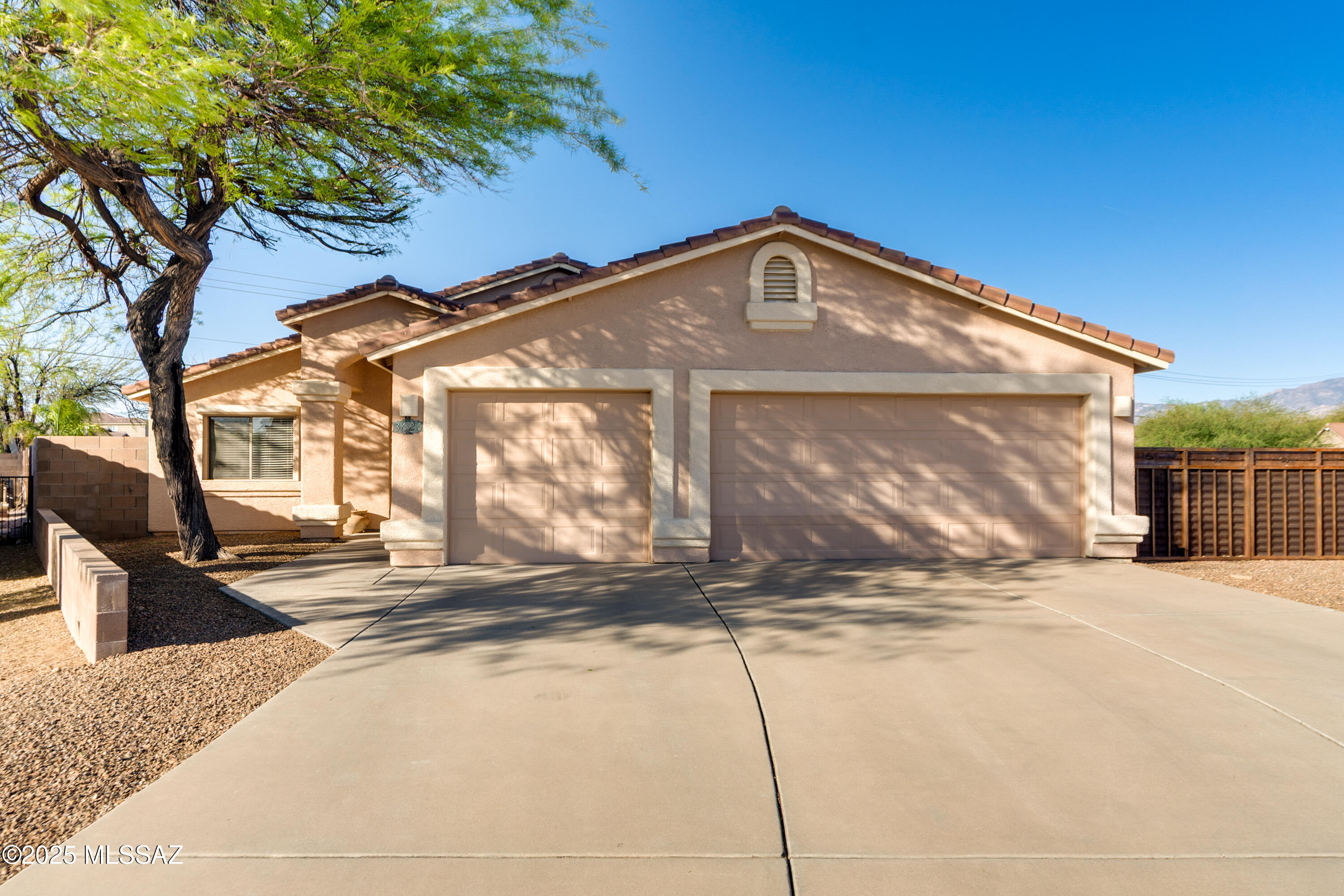 Beautiful three bedroom, two bath split floorpan home close to shopping, golf, A-rated schools, and is 10 mins from I-10. This house is a rare find in a nice neighborhood . Bathed in bright, natural light, this home features vaulted ceilings, LVP flooring and comfortably sized bedrooms. The kitchen has a breakfast bar and stainless steel appliances with granite countertops that carry into both bathrooms. Matching ceiling fans throughout including two on the large patio. You'll enjoy the spacious 1/4 acre lot featuring a sparkling 9 ft pebble tec pool with a newer pump and new drip irrigation system . Enjoy mountain views from the oversized patio which offers room for dining and more to extend your living space and entertaining.  House sits in a cul de sac with only one adjoining neighbor