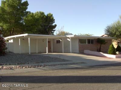Available NOW!  Very nice & well cared for brick home in Northeast Tucson, All Ceramic tile flooring, french doors, big eat-in kitchen and bonus storage/work room inside! Big and private back yard & very secluded in ground spa with waterfall.Great schools and close to everything! You will not be disappointed!Central AC & Heat. Spa AS_IS and to be maintained by tenant. Applicants must qualify. Owner/Agent.