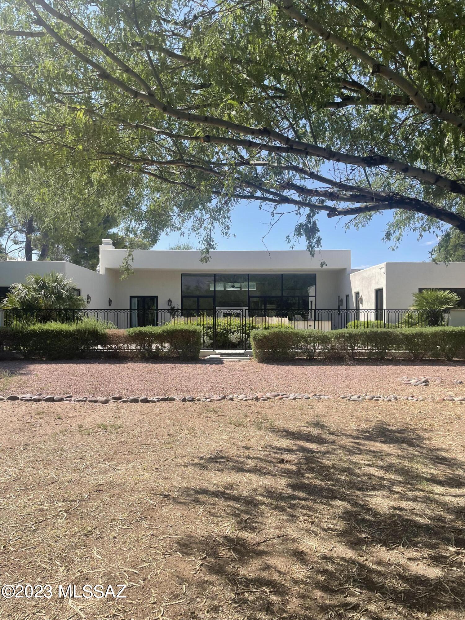 Beautiful Tucson CC home on the 15th Tee. Expansive glass doors and windows.  Stainless steel appliances, great floor plan.  A must see.