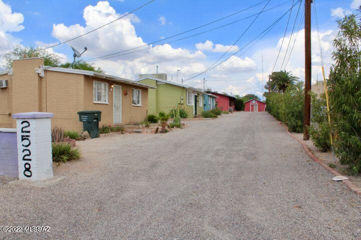 8 unit apartment style homes! 3 free-standing colorful cottages (1 bdrm/1 bath), a tri-plex (1 bdrm/1 baths) along with a 1465 square foot 2 bedroom, 2 bath single family home and a free-standing studio home.  All units have private yards and 7 have laundry hook ups. Previous owner advised that all units have been rented for 3 years. Current owner currently has 7 units rented with 1 unit that has been run as a short-term rental for approximately 3 months and generated $6191 in income. Additional storage facility on site can be used for supplies for short term rental or rent out for extra income. Plenty of parking for all units, some with covered!
