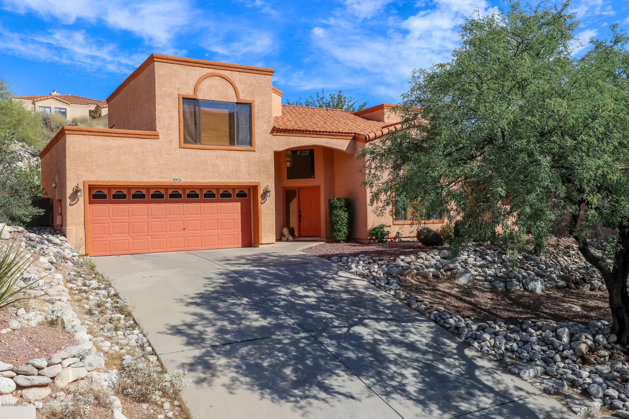 A lovely home off of Sabino Canyon Rd.  Views for days!  New dishwasher, new garage door openers.  3 BR, 2-1/2 BA home with low care plantings front and back.  Carpet in bedrooms, tile and laminate flooring.  Small neighborhood, quiet with close proximity to Sabino Canyon and all of the hiking you could want.  Do not hesitate to make this beautiful home yours.