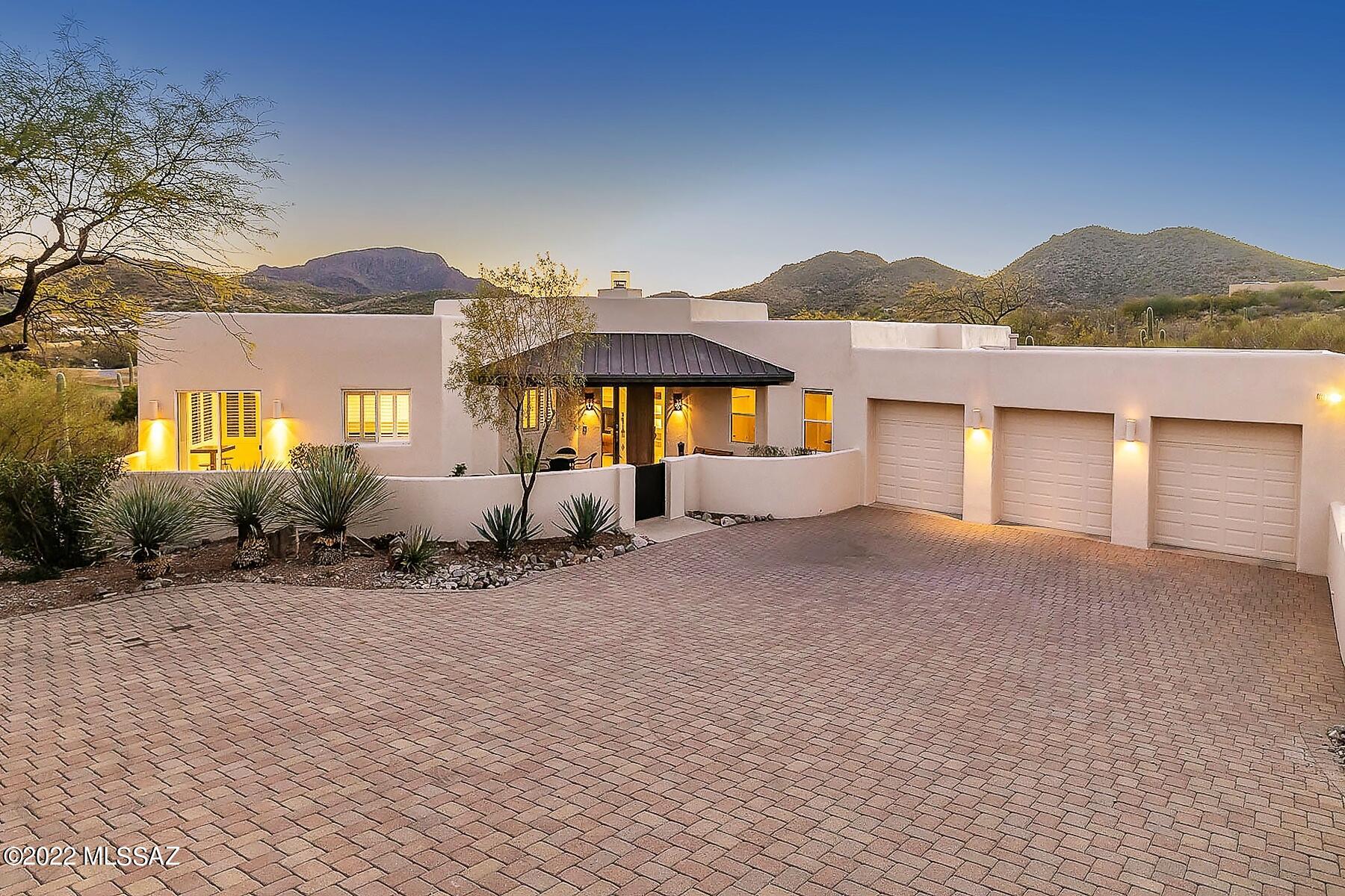 A rare opportunity to become a Resident of this most desirable community, whether a golfer, hiker or a quest for that comfortable & peaceful lifestyle. Incredible Natural Setting provides Scenic Views from this Starr Pass Gem!  Perfectly perched above gorgeous desert valley decorated with lush green Starr Pass fairways, yet just 10 minutes from Downtown!! Recent upgrades including new Exterior Paint, new HVAC Units in 2021, Tankless Water Heater and newer Appliances. Comfortable split three BRs. A fine Cook's Kitchen with breakfast nook and formal dining or escape seating area. Glorious open Fireplaced Floorplan w/ expansive window-wall opening onto an inviting deck, perfectly set to enjoy Tucson's famous Sunsets! Paver Driveway leads to charming entrance courtyard. Spacious 3 Car garage
