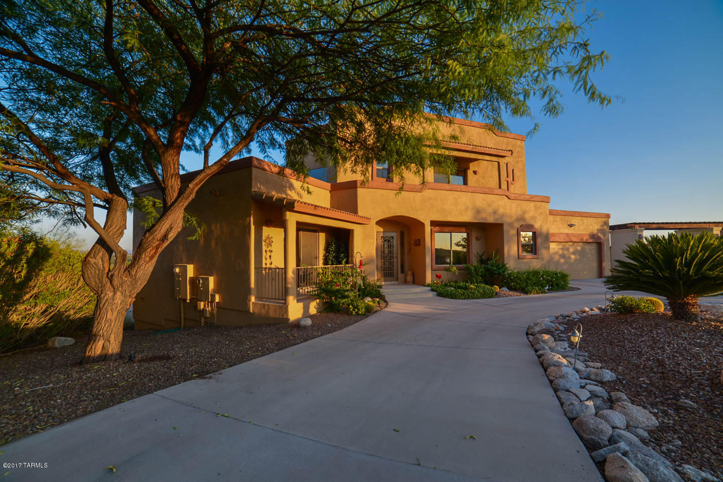 Custom Hilltop home with beautiful VIEWS of the MOUNTAINS and CITY LIGHTS from the back deck, patio & private balconies.  The main-floor has 2 over-sized Bedrooms w/ Jack-n-Jill bath.  Powder bath.  Formal Dining Room.  Spacious Kitchen w/ granite counter tops & island, cook-top, nook area w/ CITY VIEWS.  Large Family Room w/ gas fireplace, built-in Entertainment Center and sliding glass doors to deck. Generous Laundry Room w/ lots of cabinets/storage.  Upstairs you will find a spacious Master Suite w/ French doors to a private balcony & Bath w/ spa tub & separate shower.  The 2nd upstairs Bdrm includes a private balcony &  its own Full Bath.   The 676 Sq Ft Guest Quarters has a spacious Living Room w/ 3/4 Bath & 2nd room perfect for an Office or Bdrm. Owner/Agent.